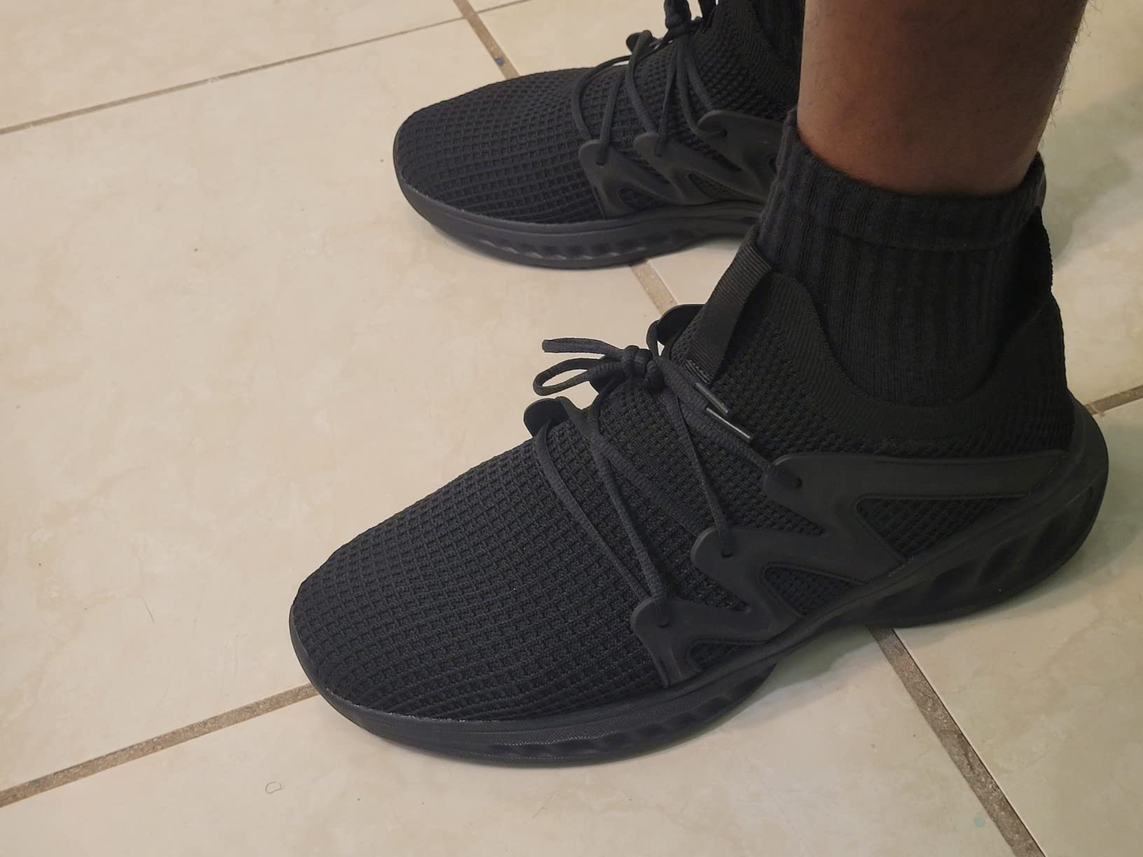 Top-down view of Pujcs shoes highlighting breathable mesh panel construction and secure midfoot fit