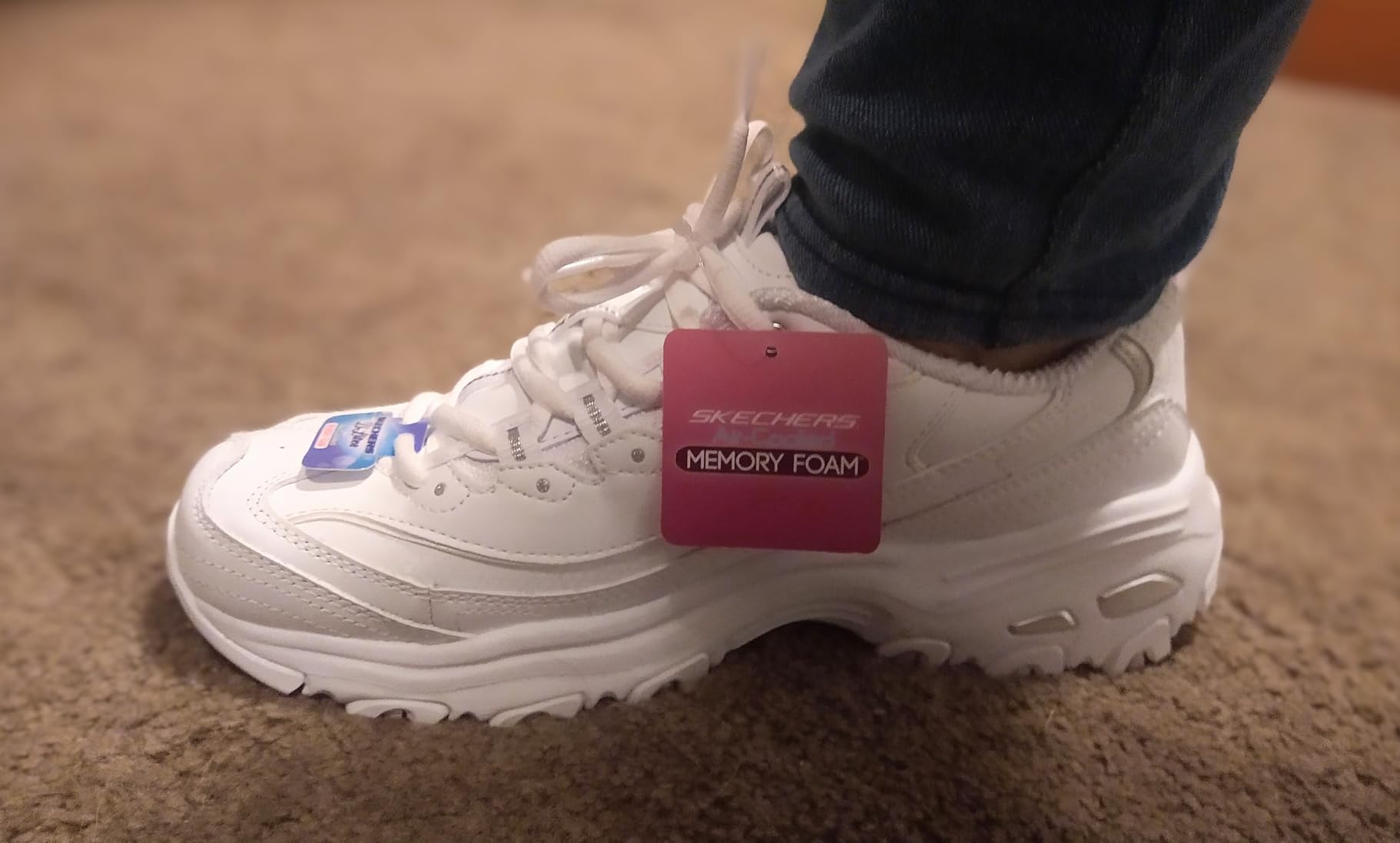 Skechers D'Lites memory foam insole detail showing cushioning construction