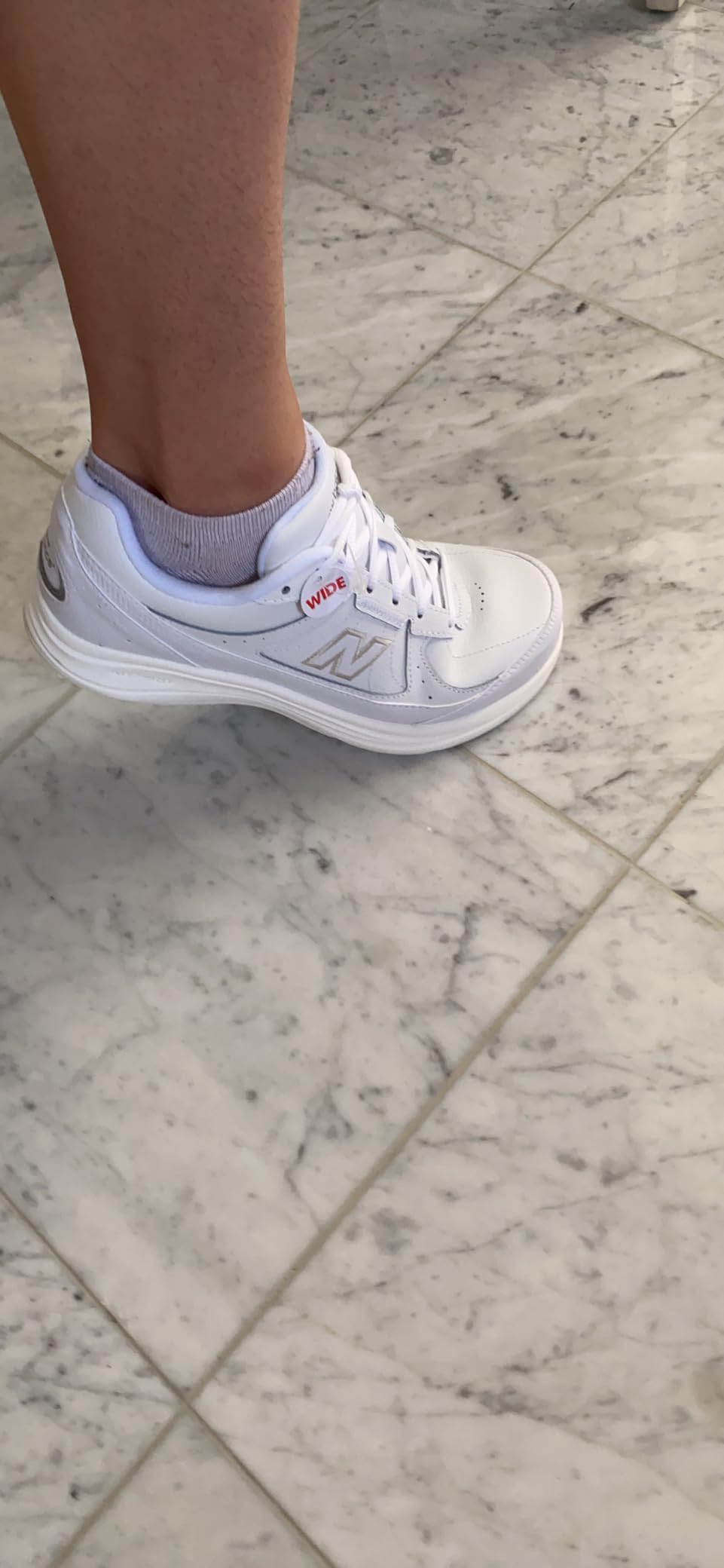 Bottom view of New Balance 577 V1 showing rubber outsole tread pattern and wear zones