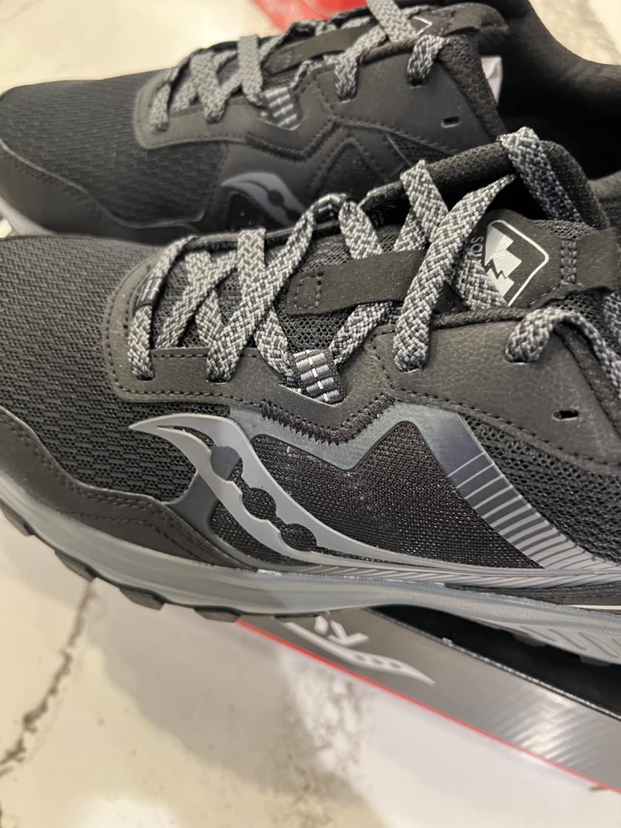 Saucony Men's Excursion TR16 trail running shoe main product view showing aggressive lug pattern and VERSARUN midsole