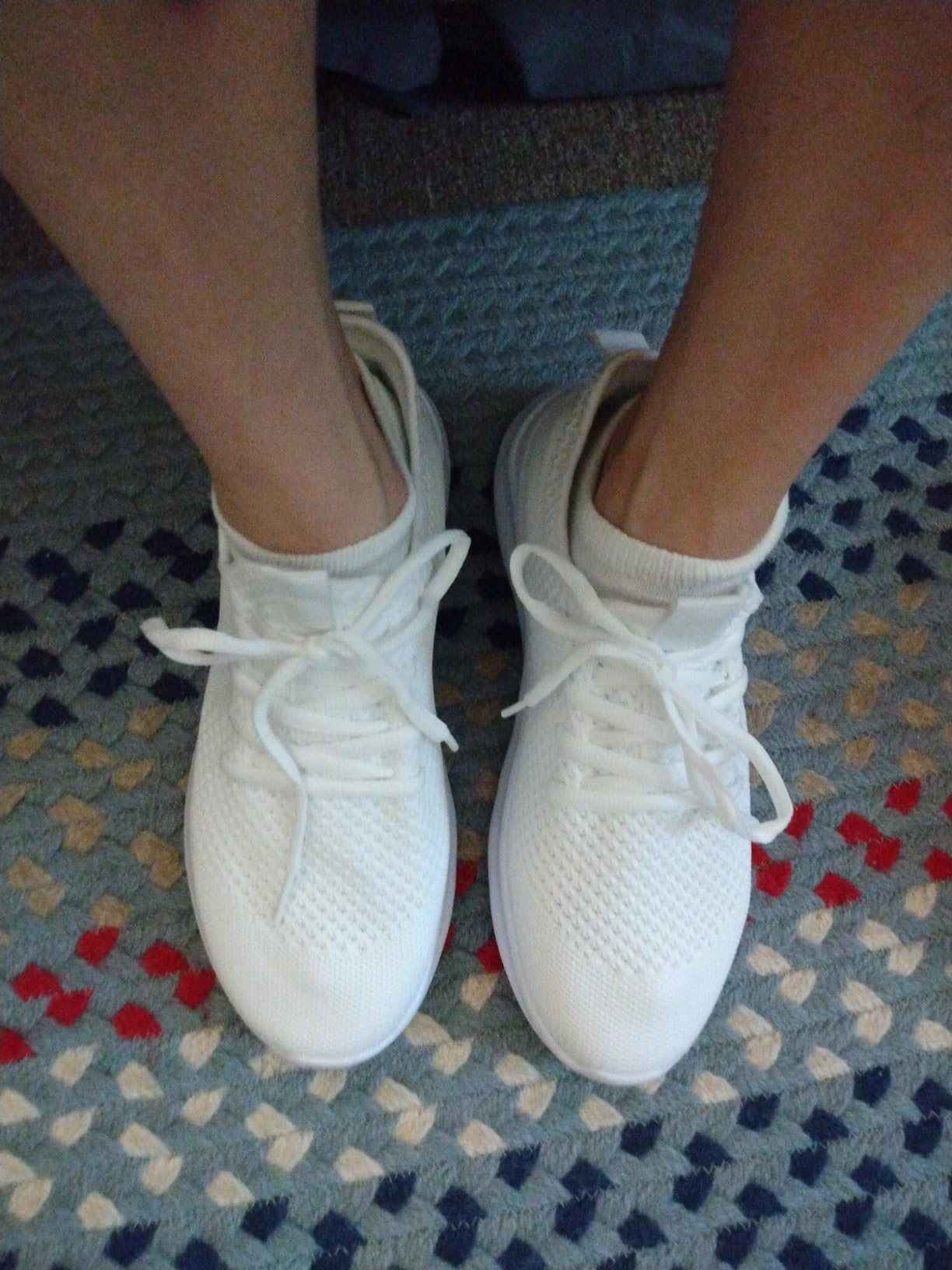 Side profile view of WYGRQBN walking shoes showing EVA sole construction and mesh upper profile