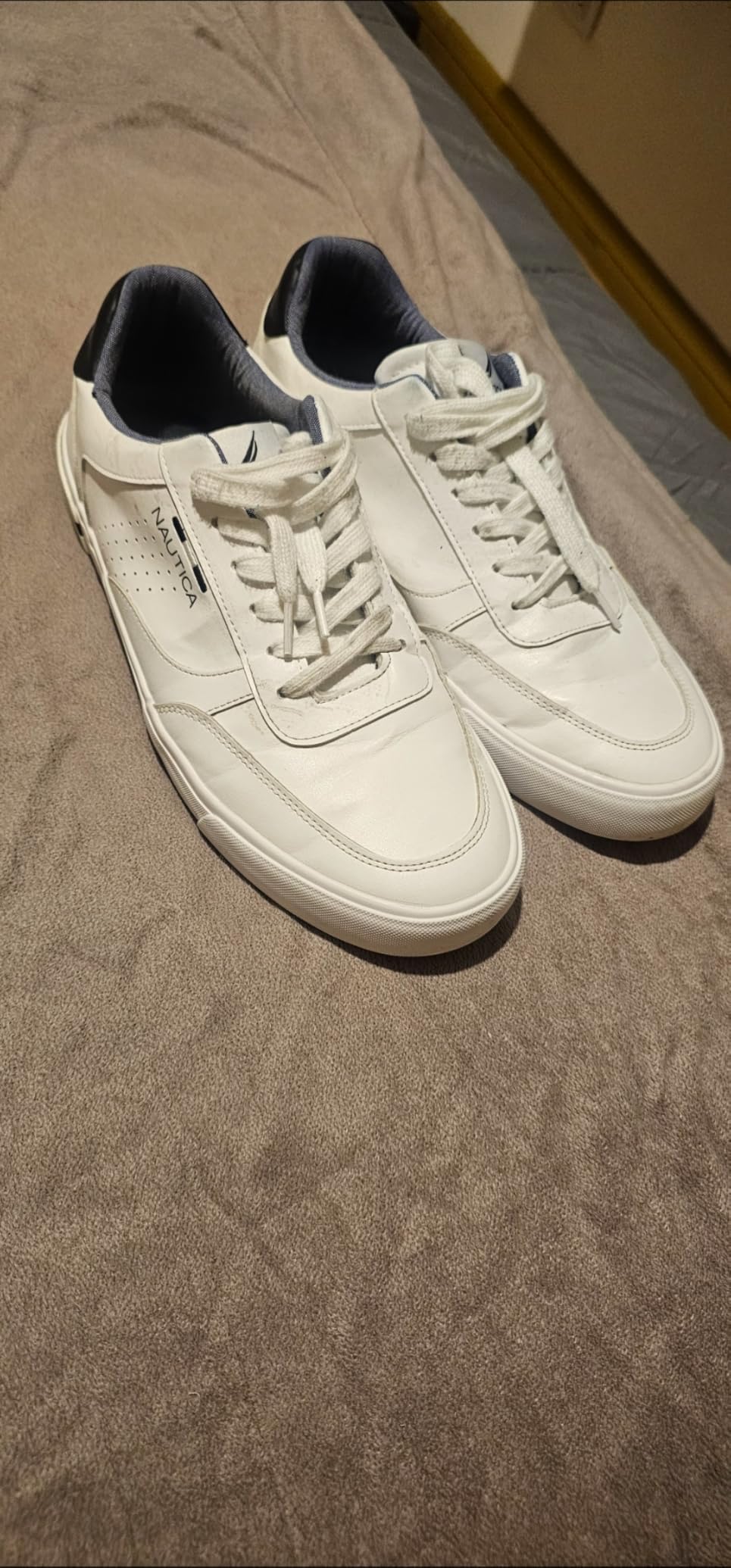 Interior view of Nautica shoe showing EVA insole cushioning and synthetic fabric heel lining detail