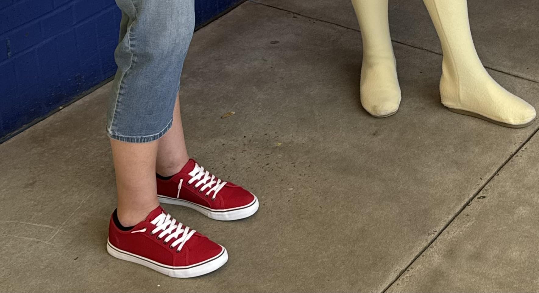 Side view of XRH canvas sneakers showing profile and sole construction detail