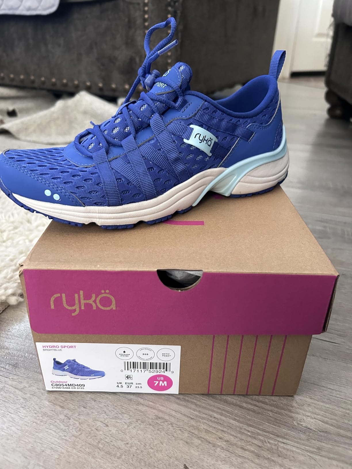 Ryka Hydro Sport sole showing drainage holes and water evacuation system during pool-to-dry transition