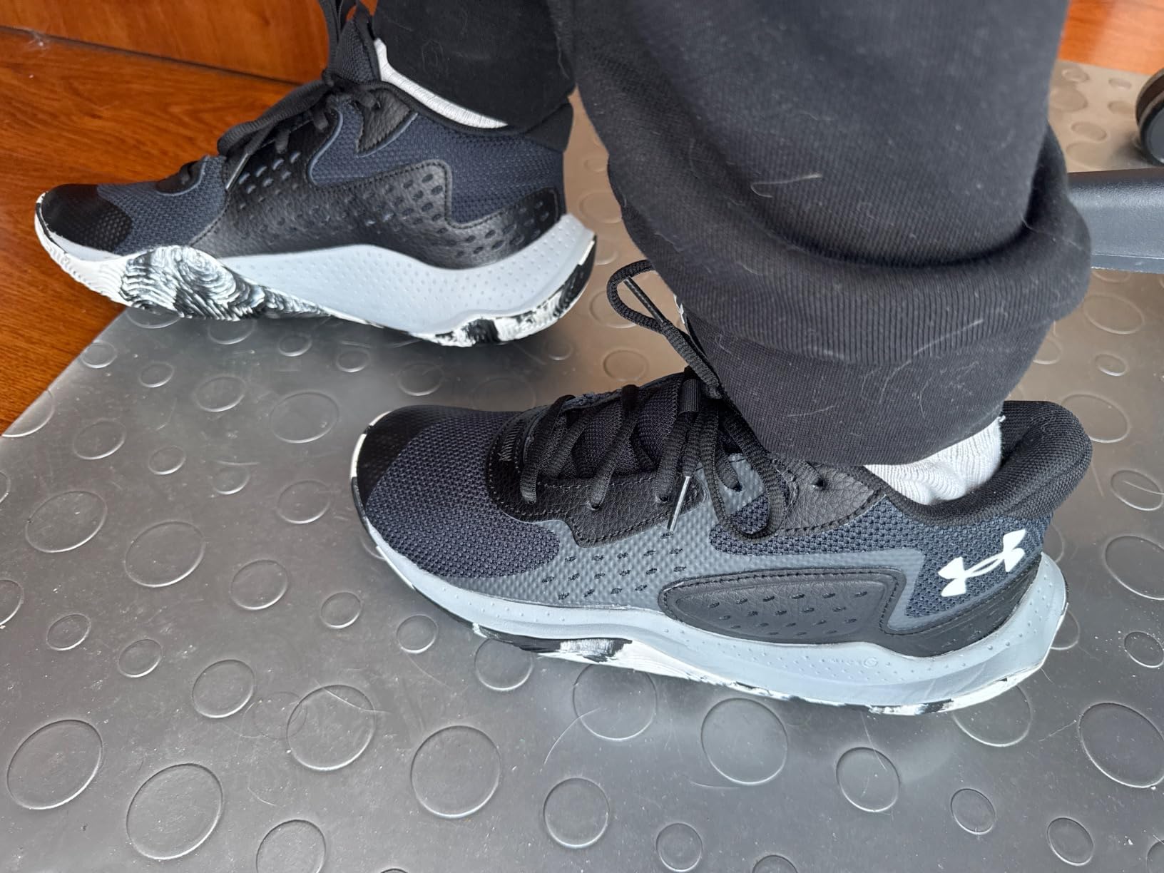 Basketball players wearing Under Armour Jet 23 shoes during recreational community basketball game