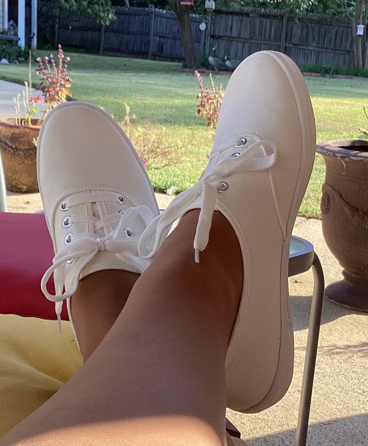 Collection of TUOPIN canvas sneakers in multiple color options showing range of styles