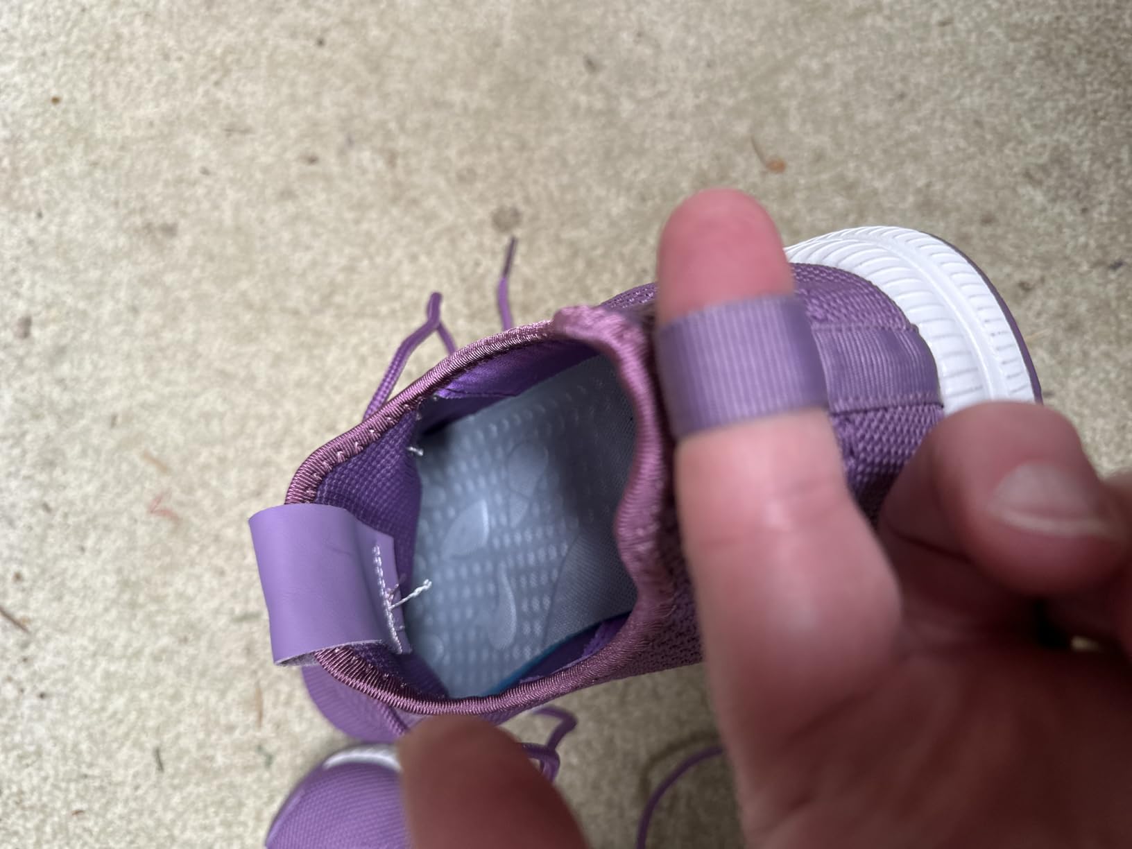 Close-up of ZOVE shoes showing the pull-on design with heel and front loops for easy entry