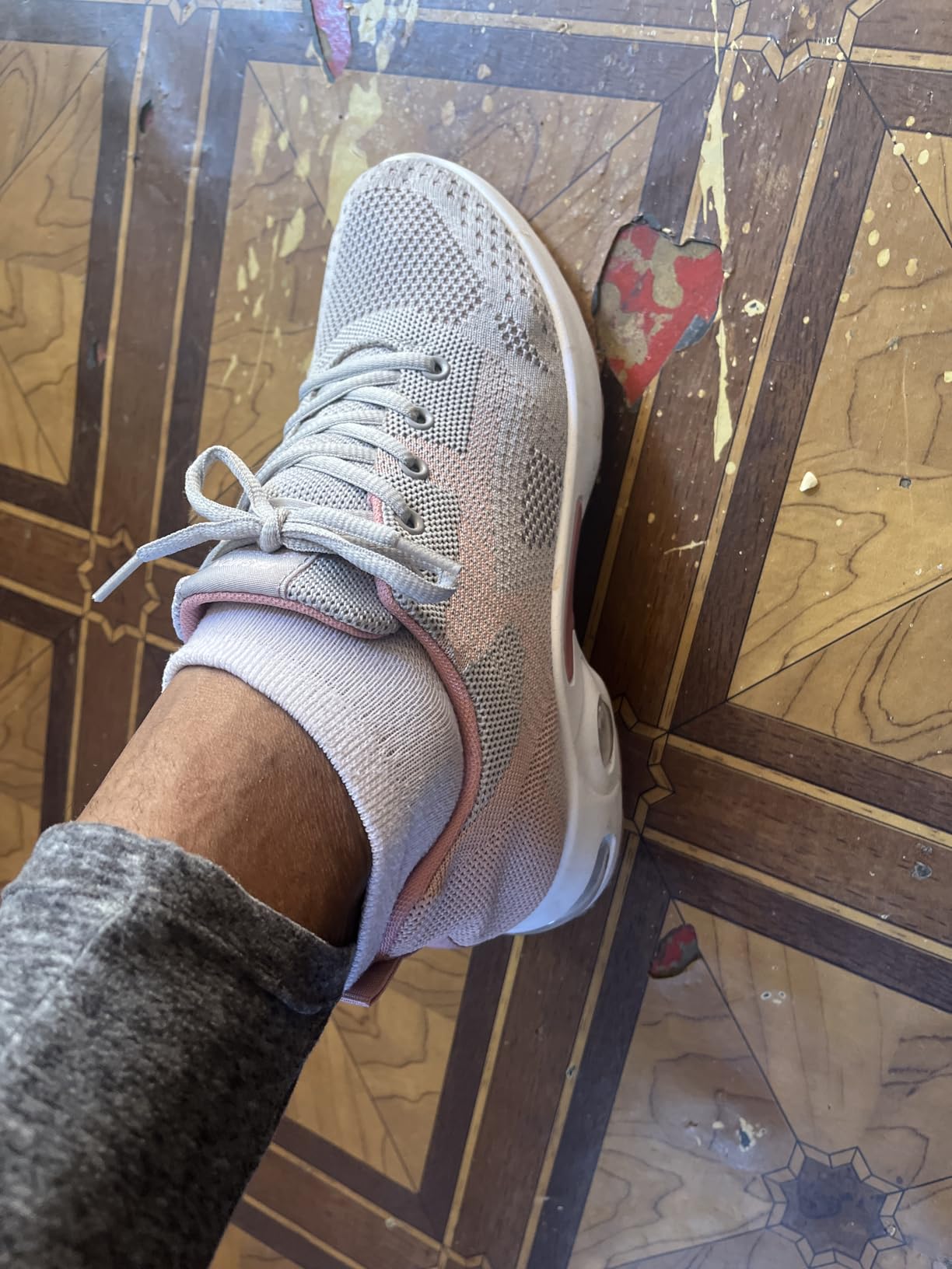 Real user photo of Padgene women's sneakers showing actual daily wear conditions over six weeks
