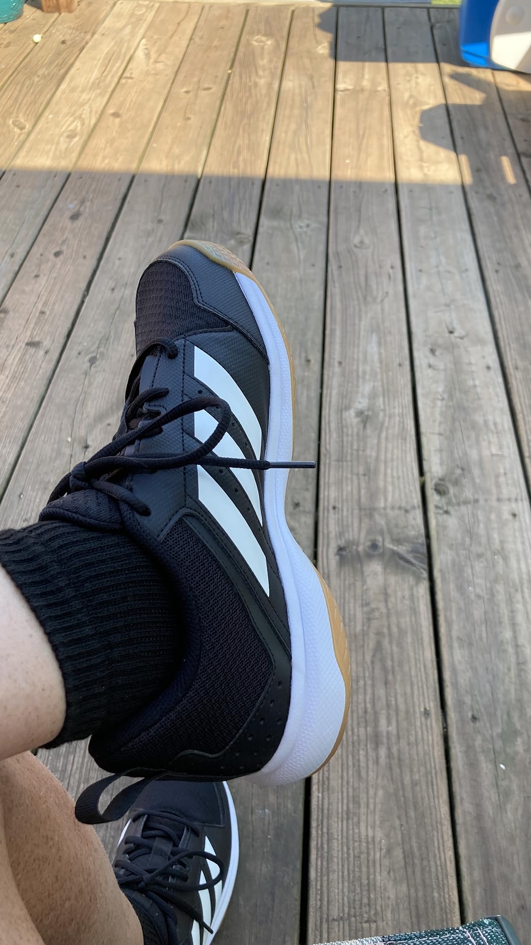 adidas Ligra 7 outsole detail showing multi-directional rubber traction pattern for indoor courts