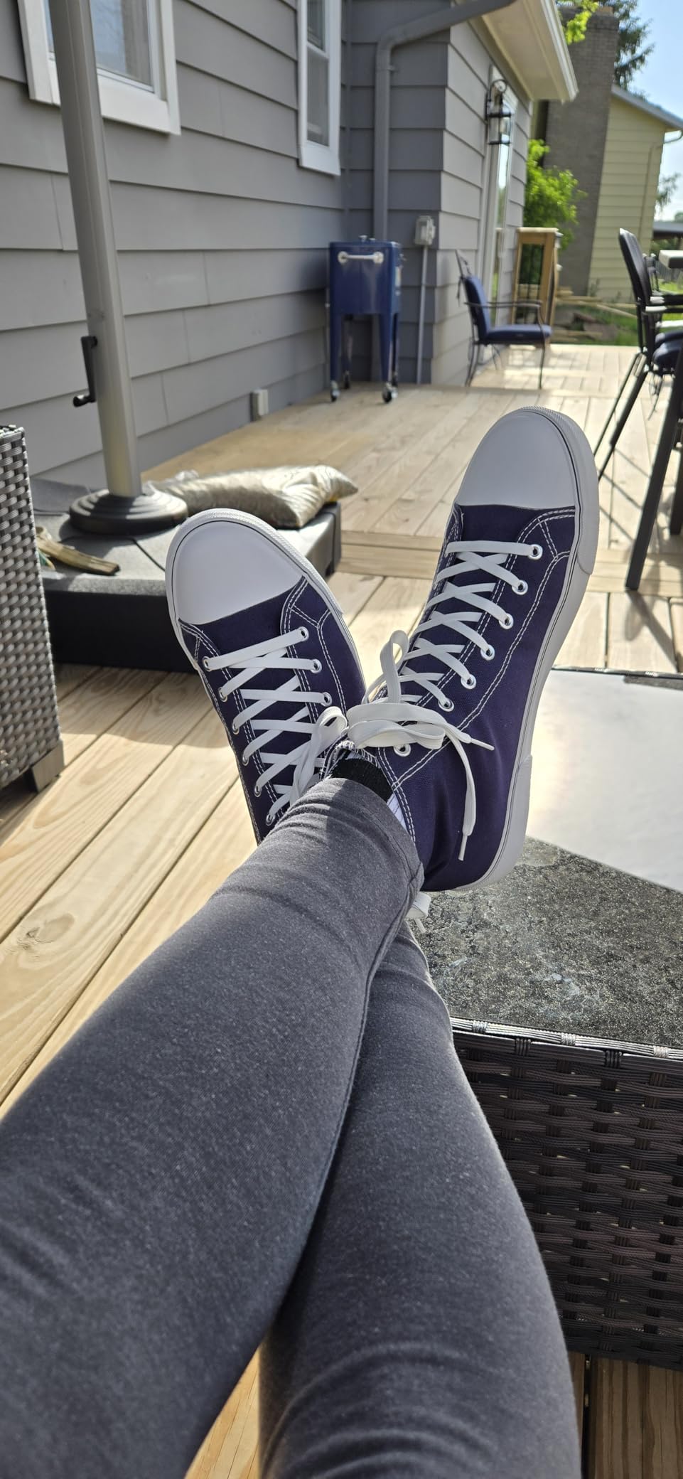 hash bubbie high top sneakers on feet showing rounded toe design during daily wear activities