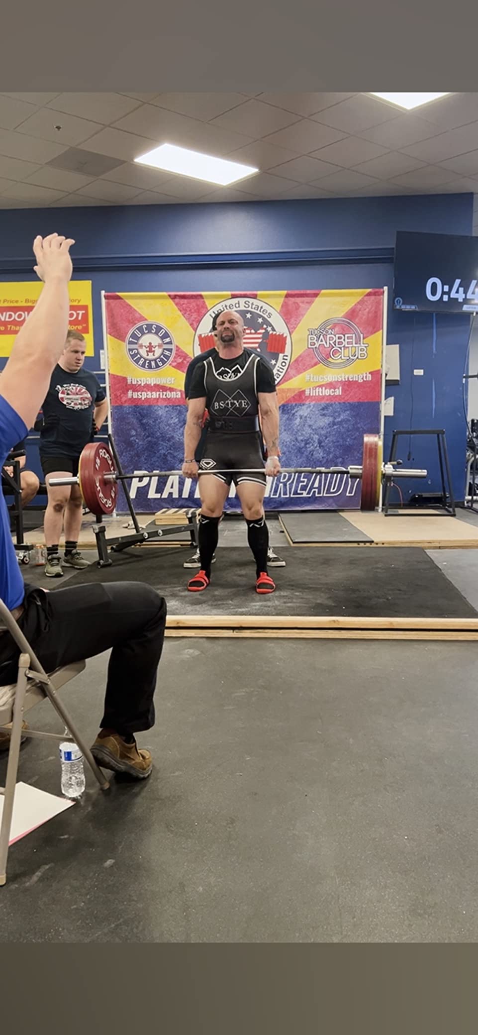 Shoe being worn during actual powerlifting session showing fit