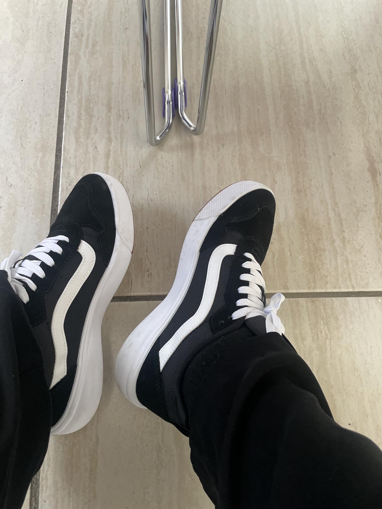Vans Range EXP in outdoor urban lifestyle context showing versatile styling across settings