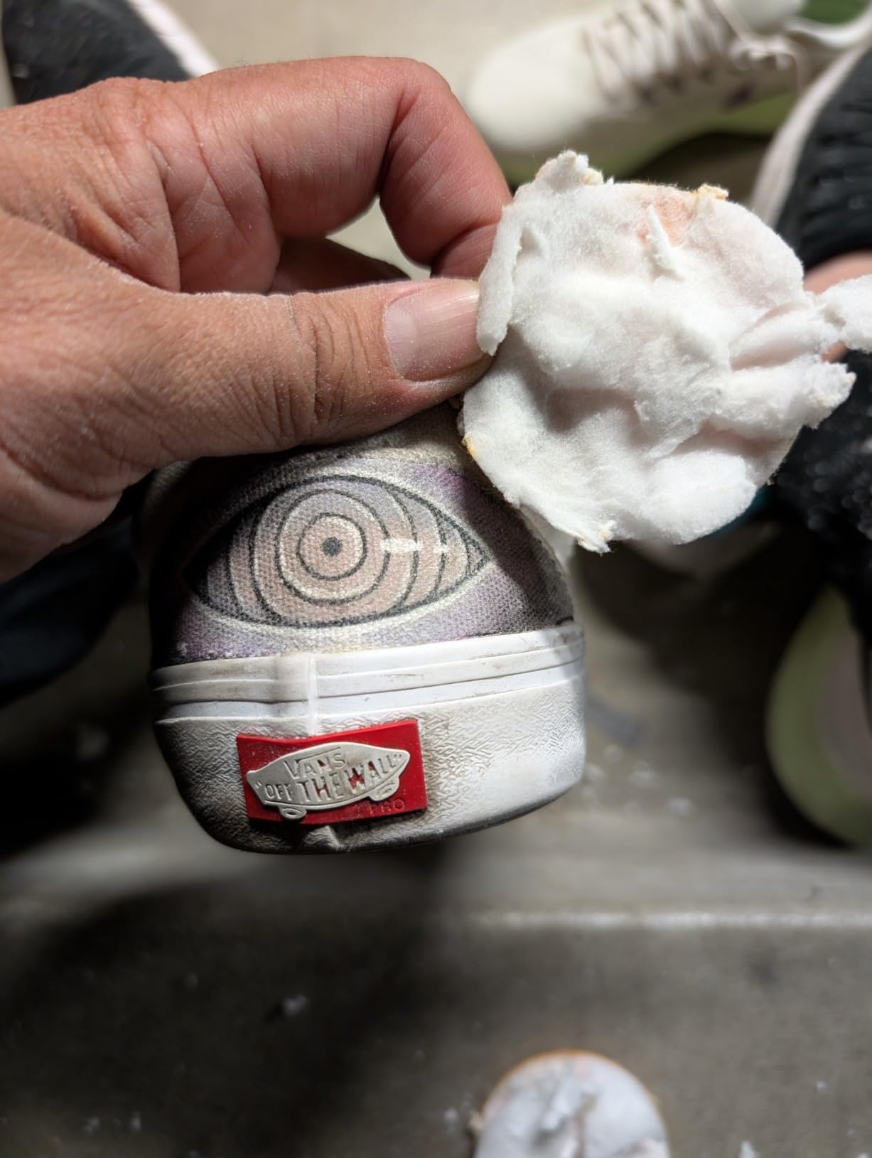 SneakERASERS being tested on leather sneaker upper showing effectiveness across different materials