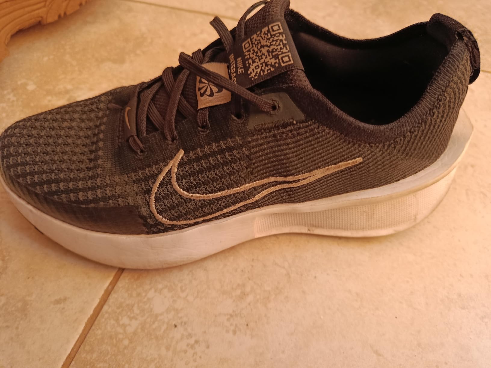 Nike Revolution 7 showing mesh upper design and rubber outsole