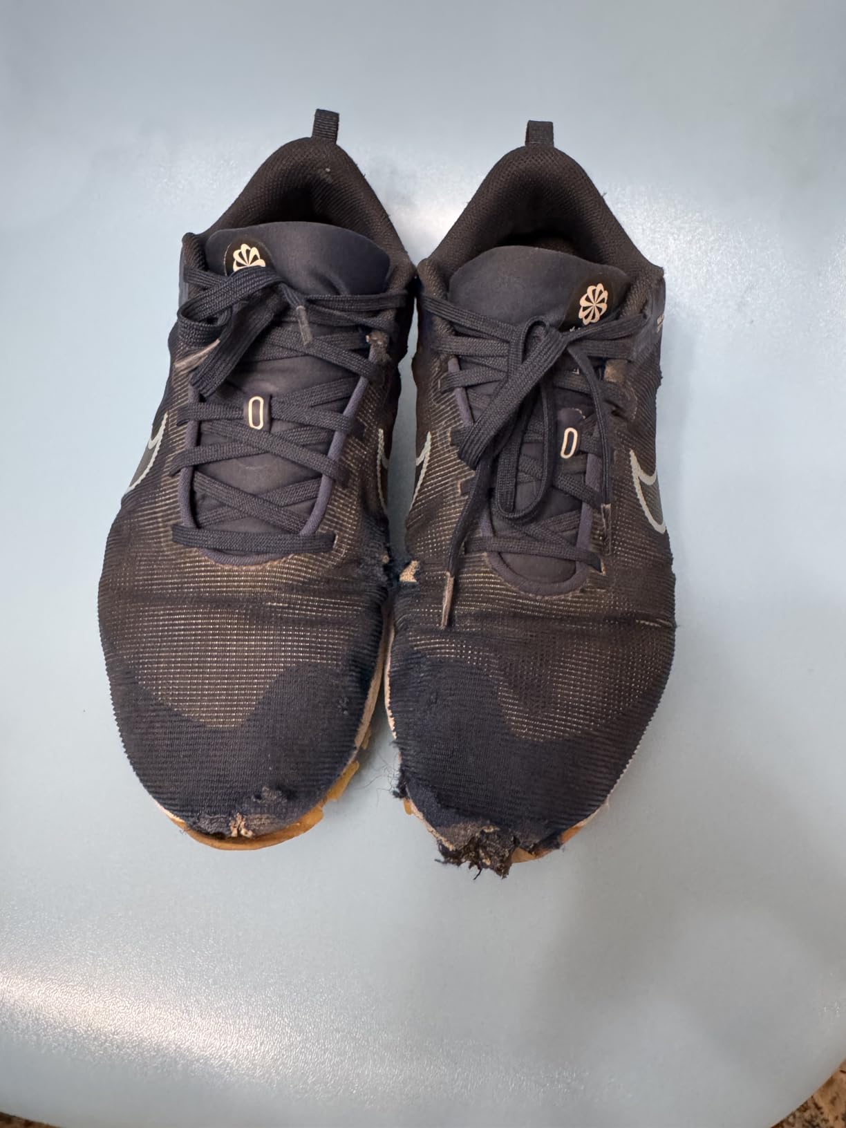 Nike Downshifter 12 after full testing period showing final condition and performance assessment
