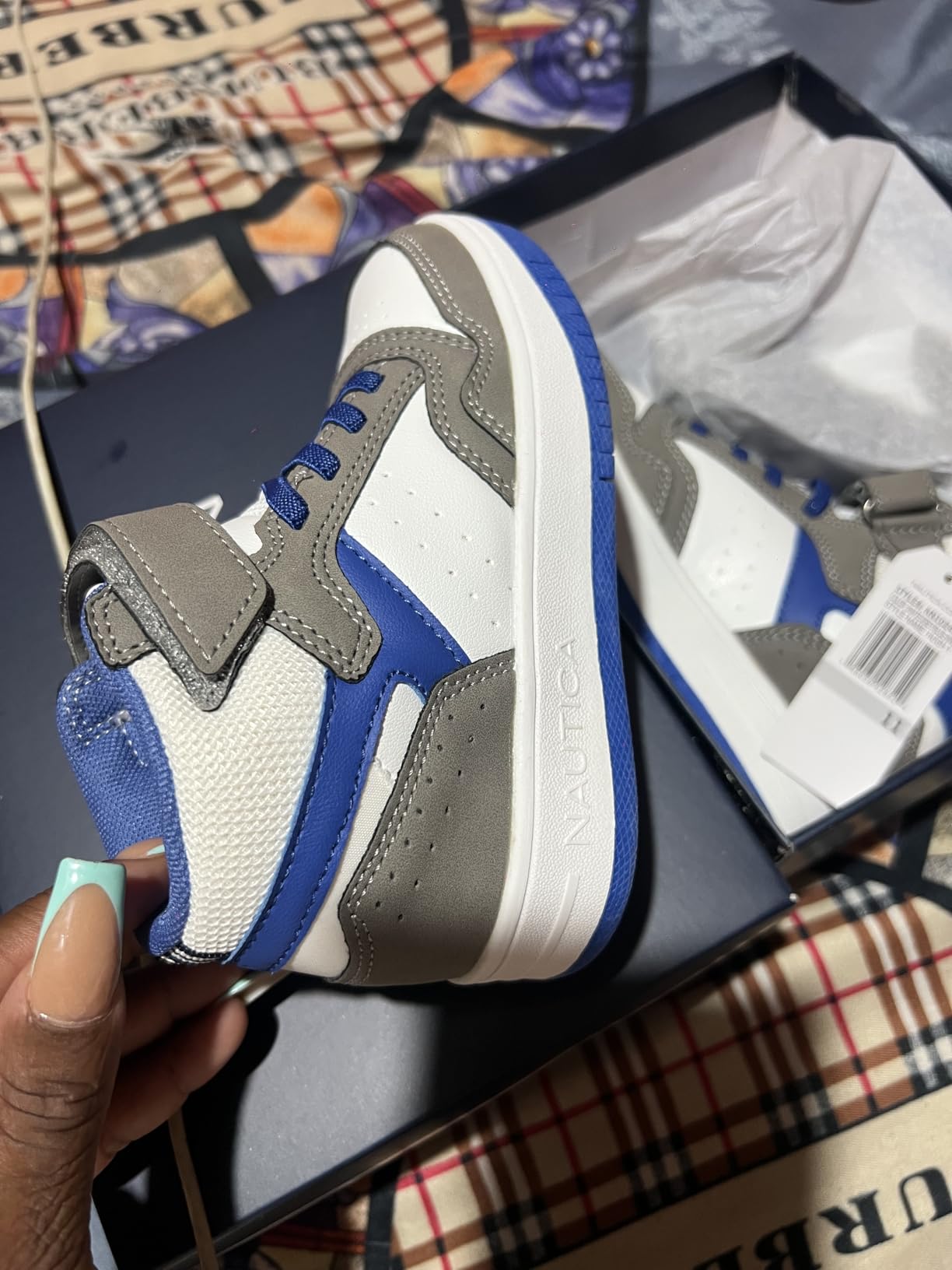 Close-up of Nautica Kids Horizon sneaker showing mesh upper construction and high-top ankle collar detail