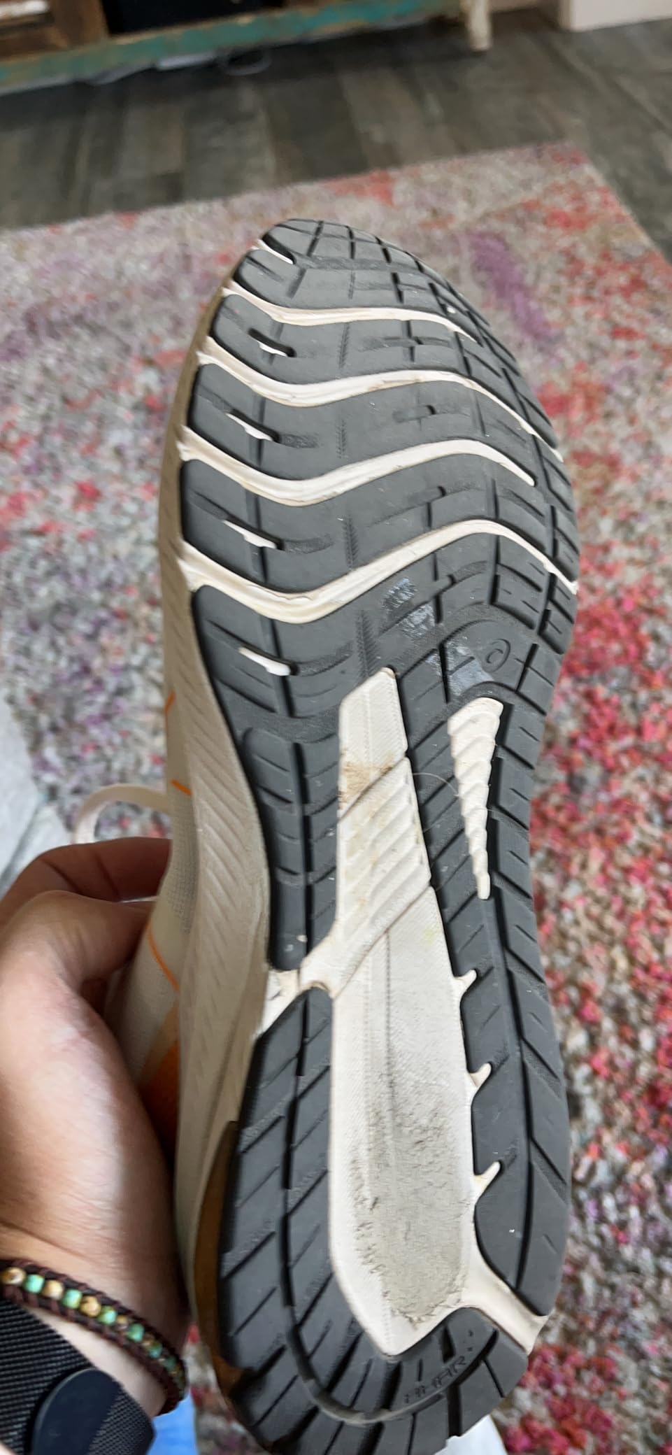 ASICS GT-1000 12 showing outsole wear pattern after extended testing