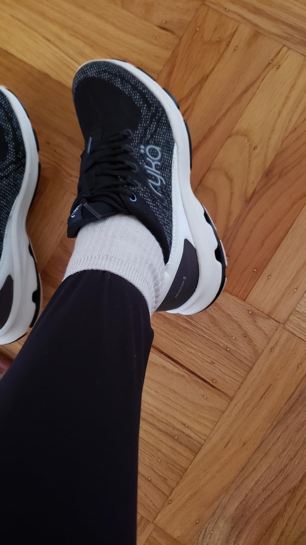 Ryka Devotion X showing women's anatomical foot design and arch support engineering visible from heel to toe
