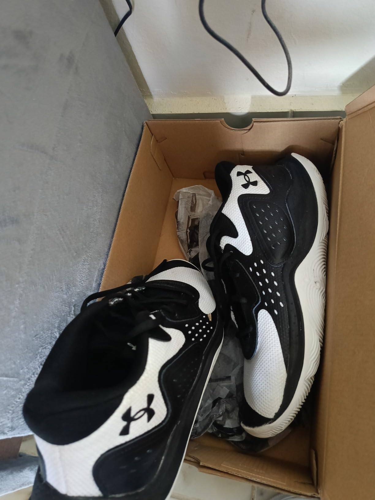 Under Armour Jet 23 basketball shoe during direction change showing lateral support from upper construction