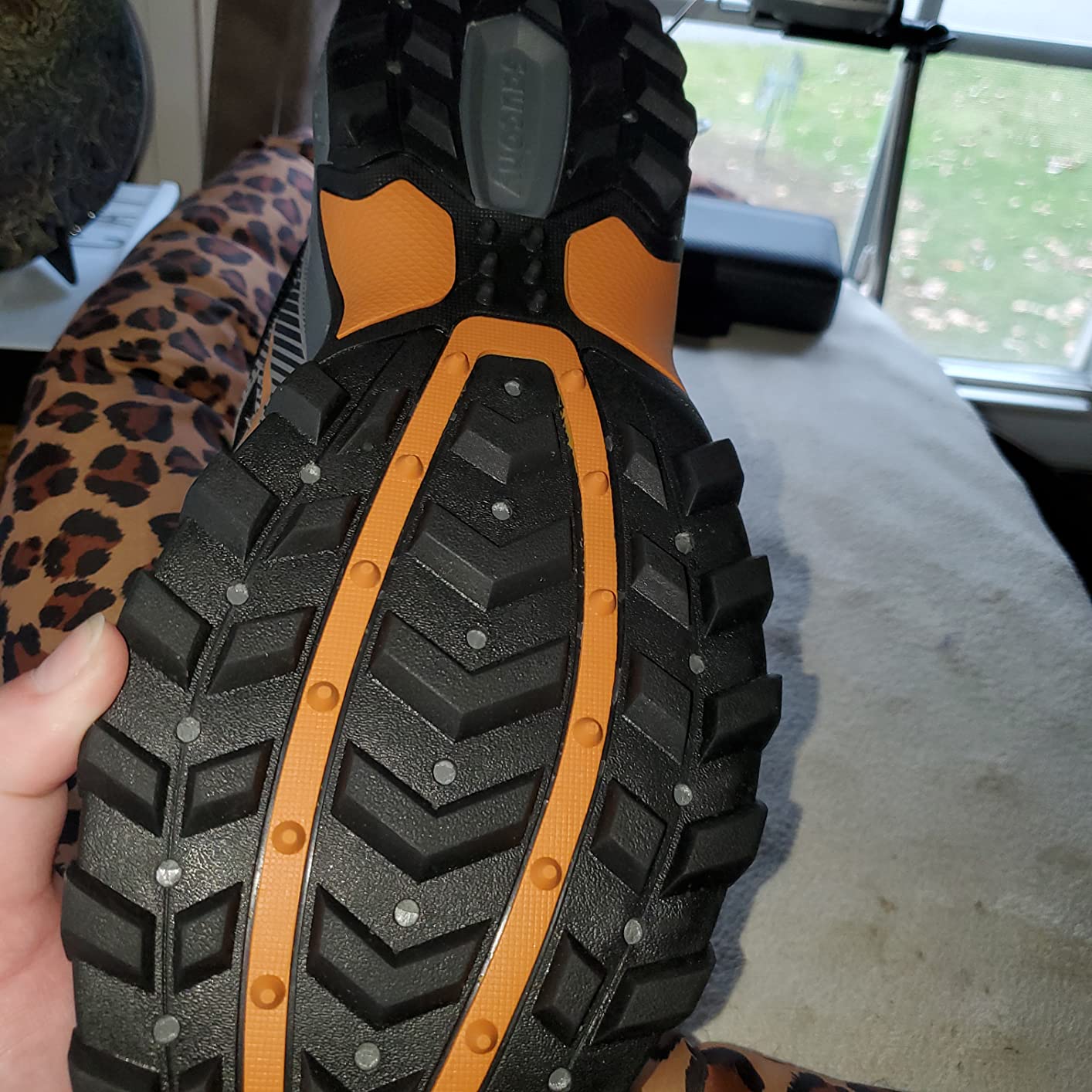 Saucony Men's Excursion TR16 shown in natural outdoor setting during day hiking use case illustrating proper fit in context