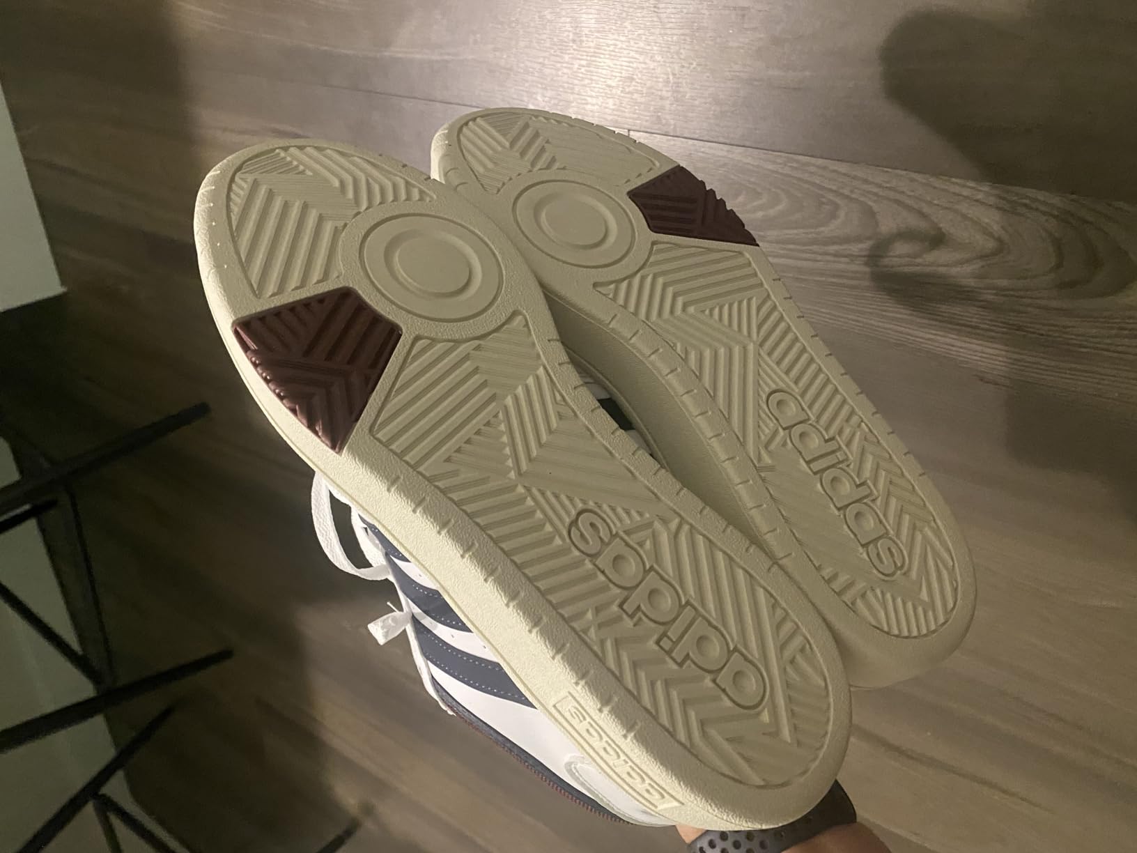 Final product shot of Adidas Hoops 3.0 Mid showing classic design suitable for court and casual wear