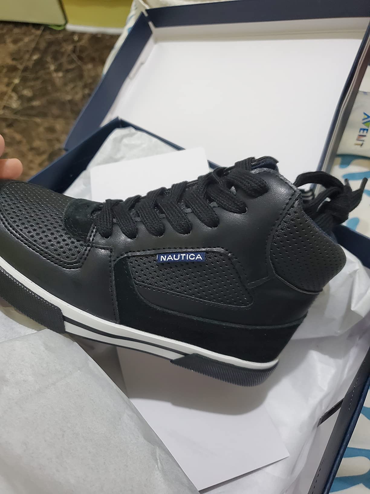 Final product shot of Nautica Kids Horizon sneakers showing overall design and construction quality
