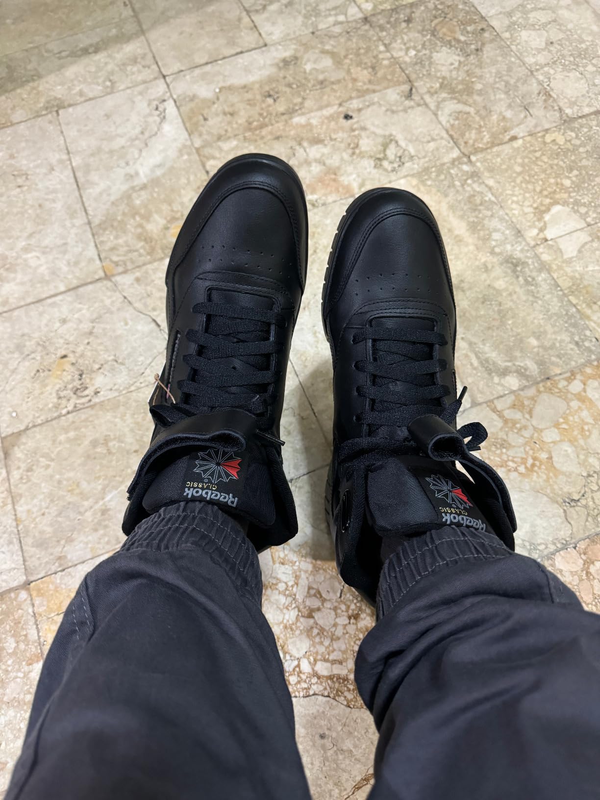 Reebok EX-O-FIT HI showing Union Jack logo and construction quality with clean stitching detail