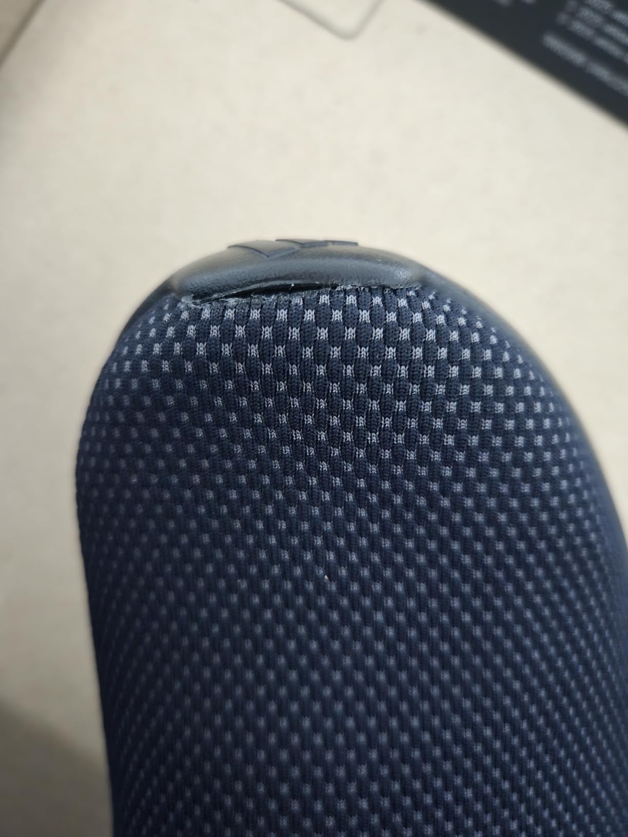Close-up of Adidas Lite Racer Adapt 7.0 showing structural stress point near lace eyelet system