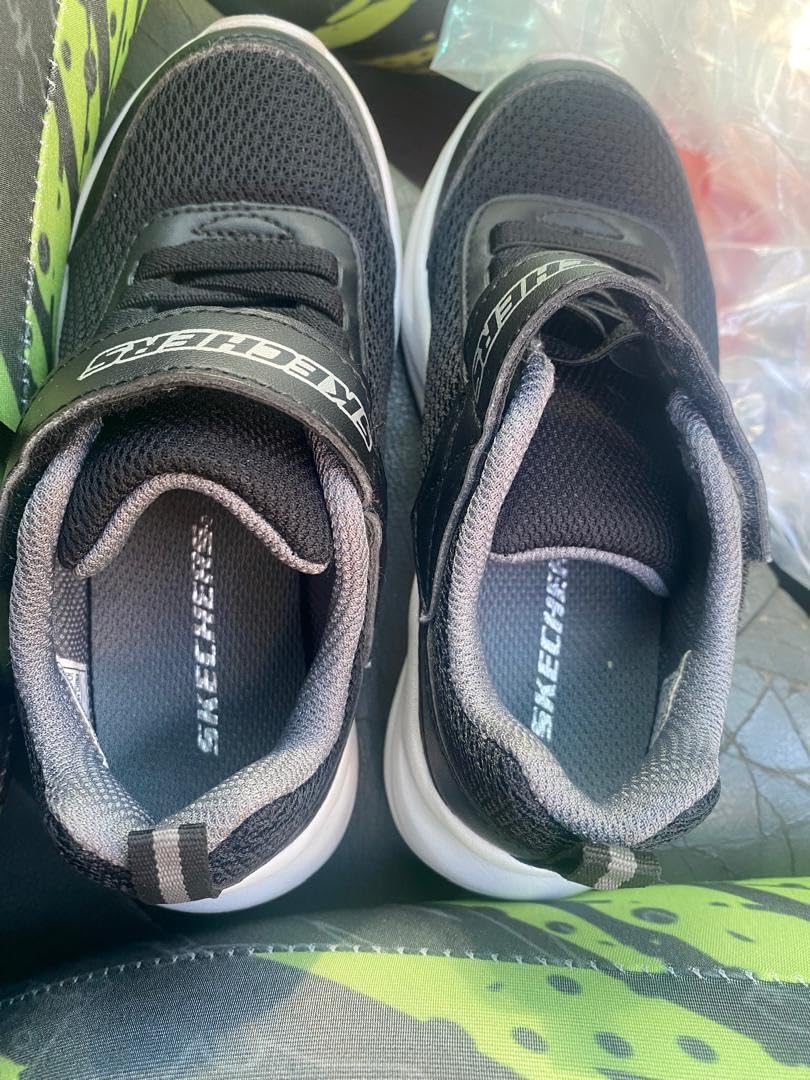 Skechers Dynamatic lifestyle shot showing kids wearing shoes