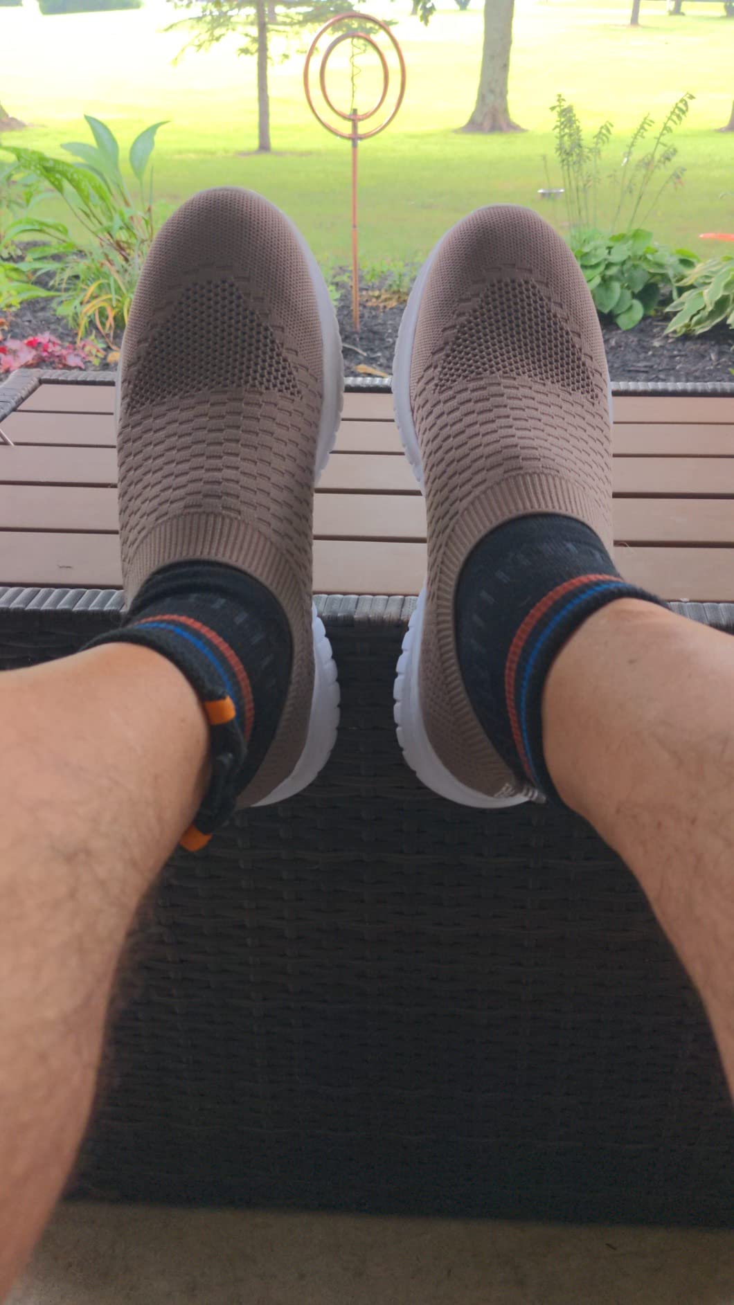 Konhill athletic walking shoes showing comfortable immediate fit with knit upper on feet during casual daily wear