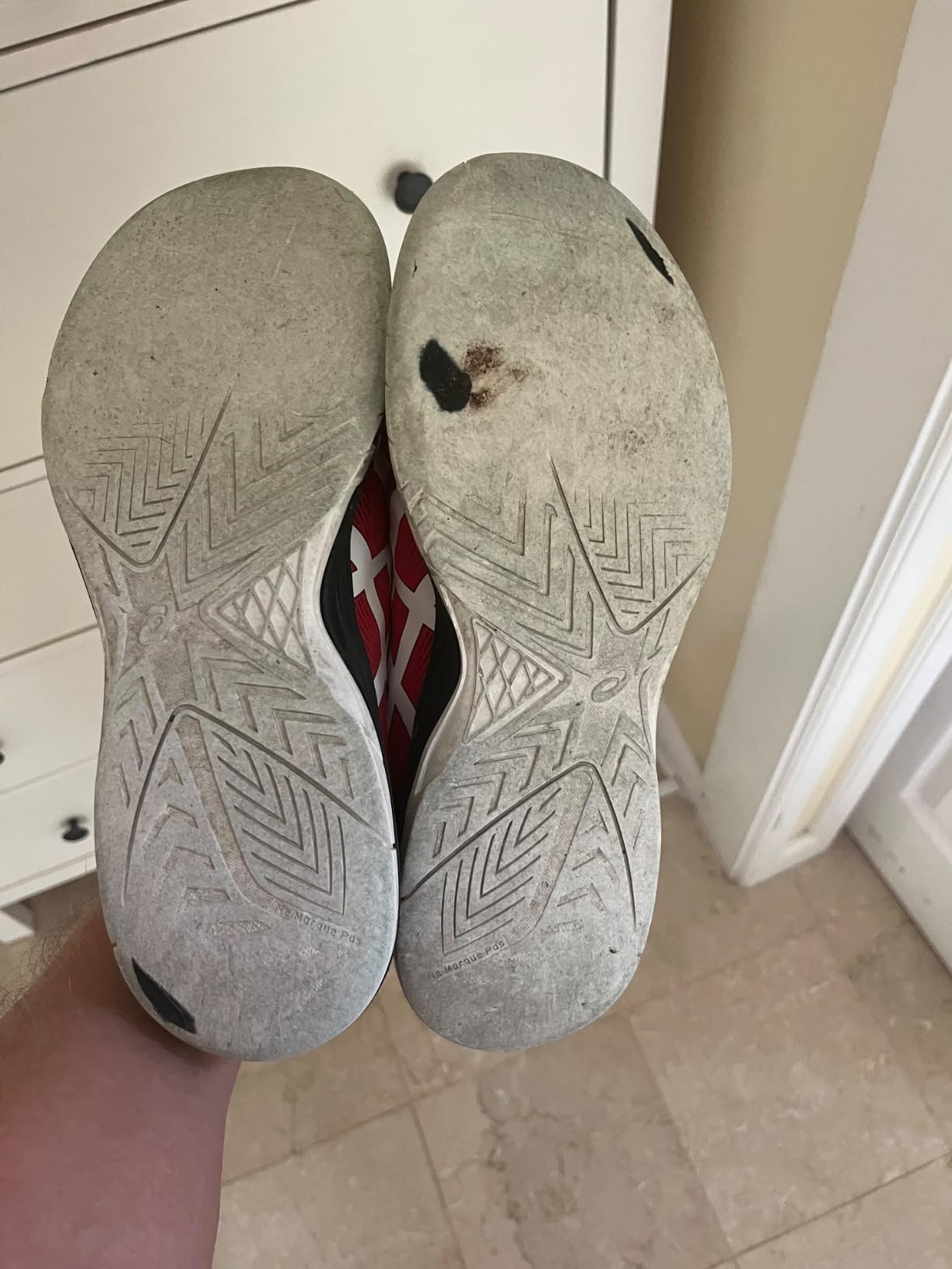 Worn ASICS Upcourt 5 outsole showing visible sole wear patterns after extended outdoor pickleball use