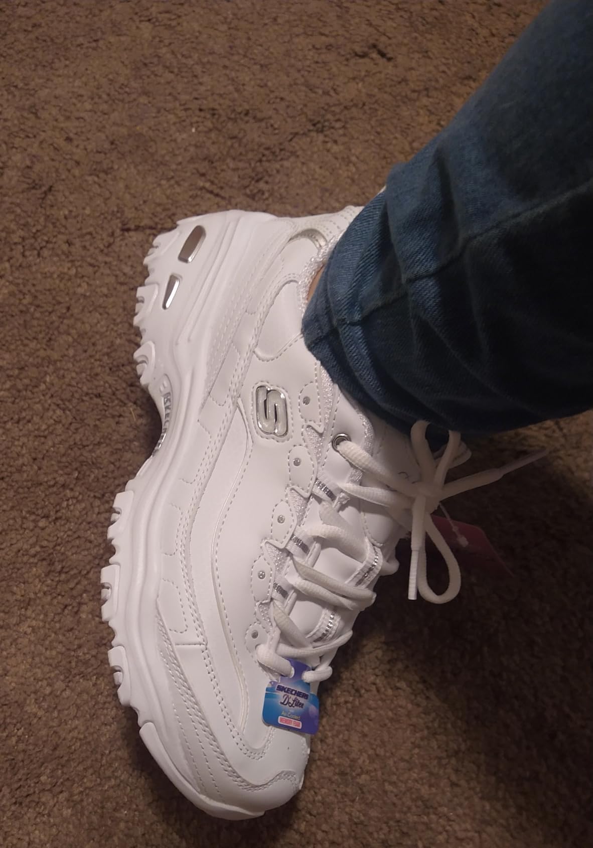 Skechers D'Lites worn outdoors showing lifestyle performance in real-world setting