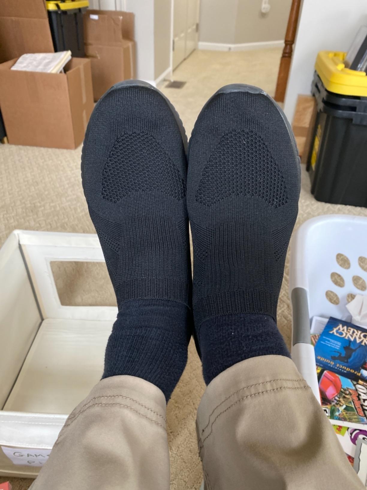 Konhill men's walking shoes being worn during daily activities showing practical casual use in real-world conditions