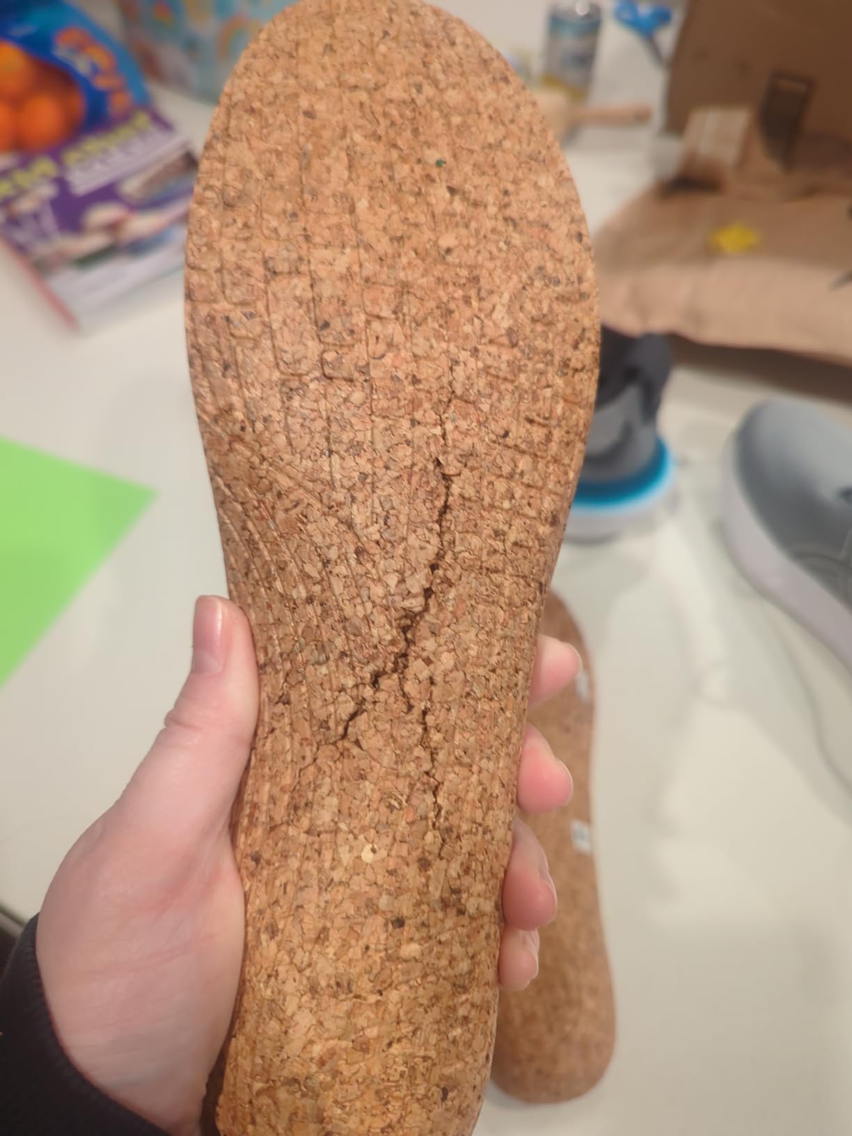 SOLE Performance Medium insoles fitted in work boots and running shoes showing cross-footwear compatibility