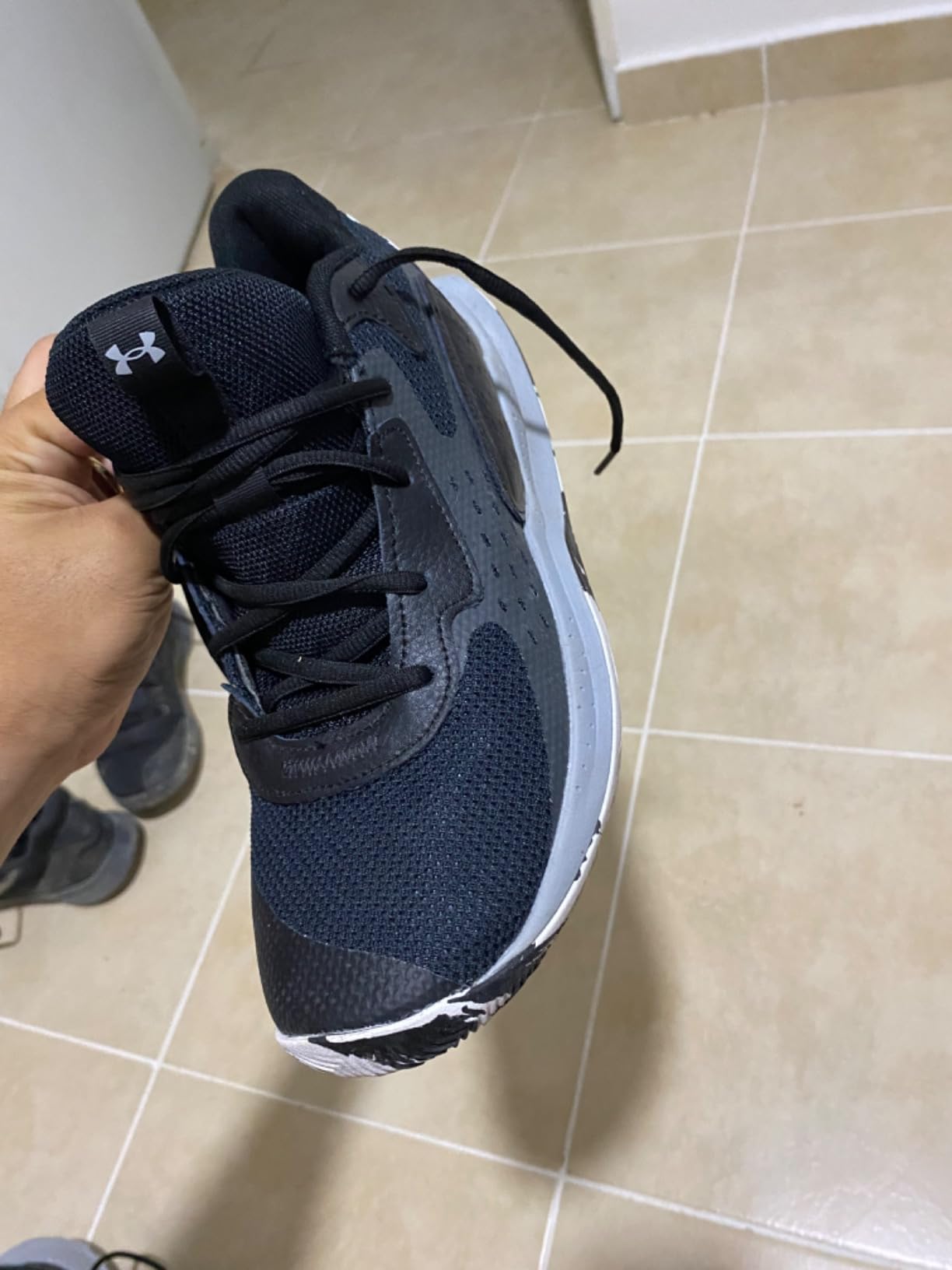 Under Armour Jet 23 side profile showing full-length Micro G midsole and anatomical outsole construction