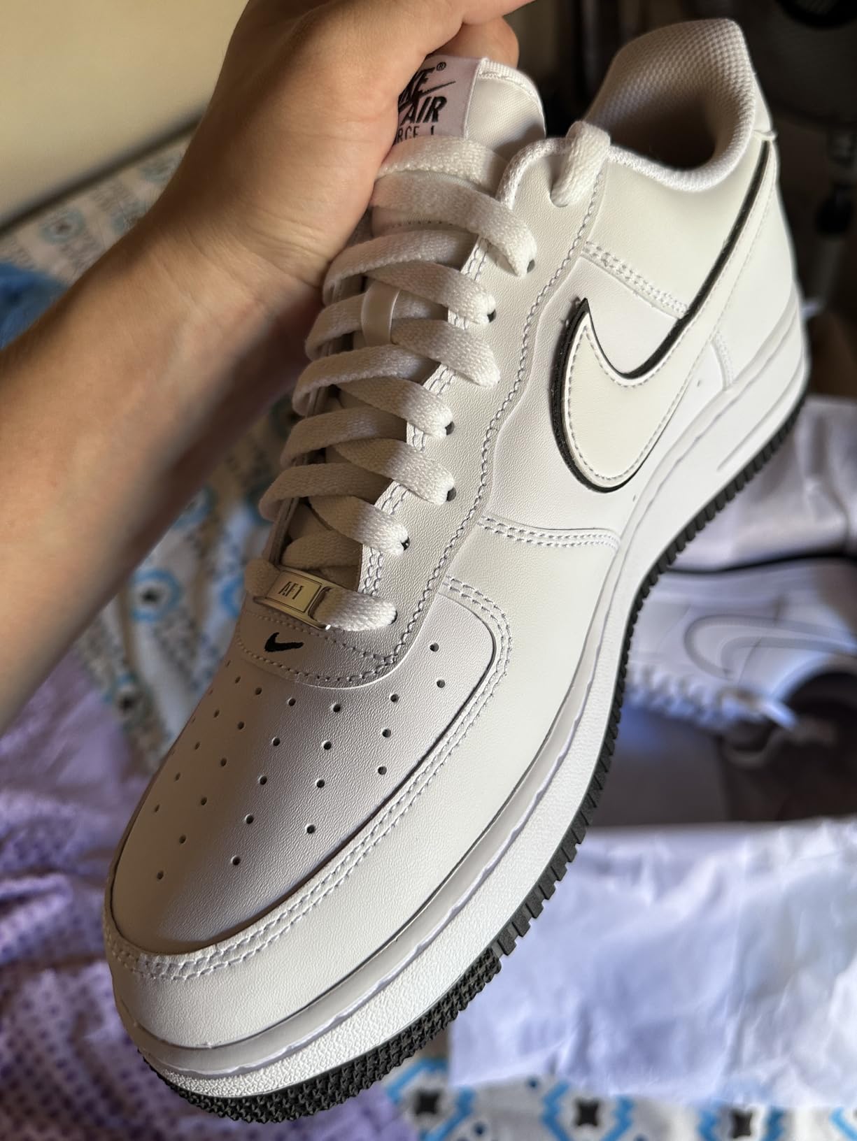 Nike Air Force 1 '07 worn in lifestyle setting showing everyday versatility with jeans and casual wear