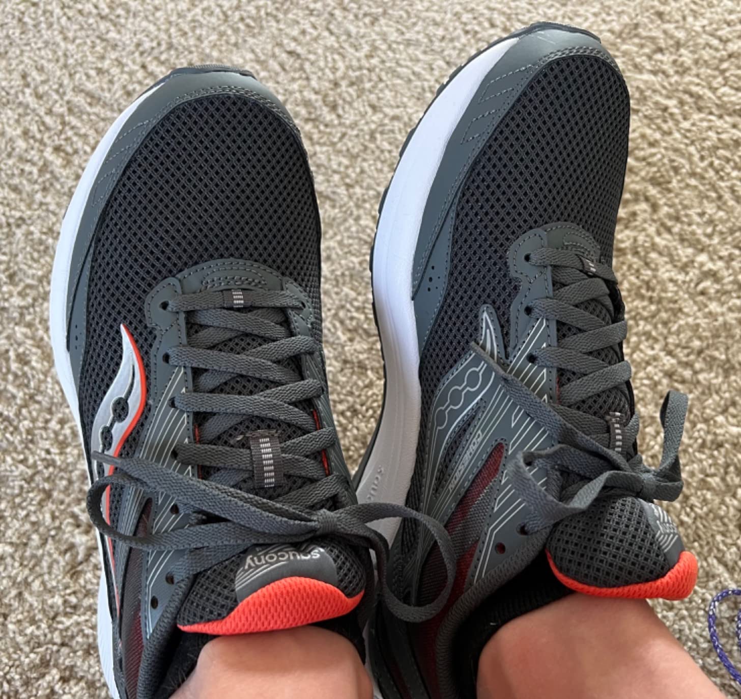 Saucony Men's Cohesion 15 grey colorway showing VERSARUN cushioning technology and overall design