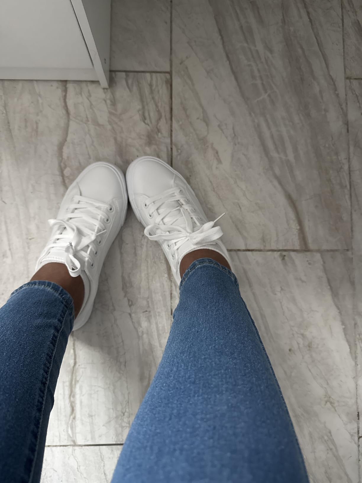 SERNIAL white tennis shoes shown against SERNIAL marketing claims comparison