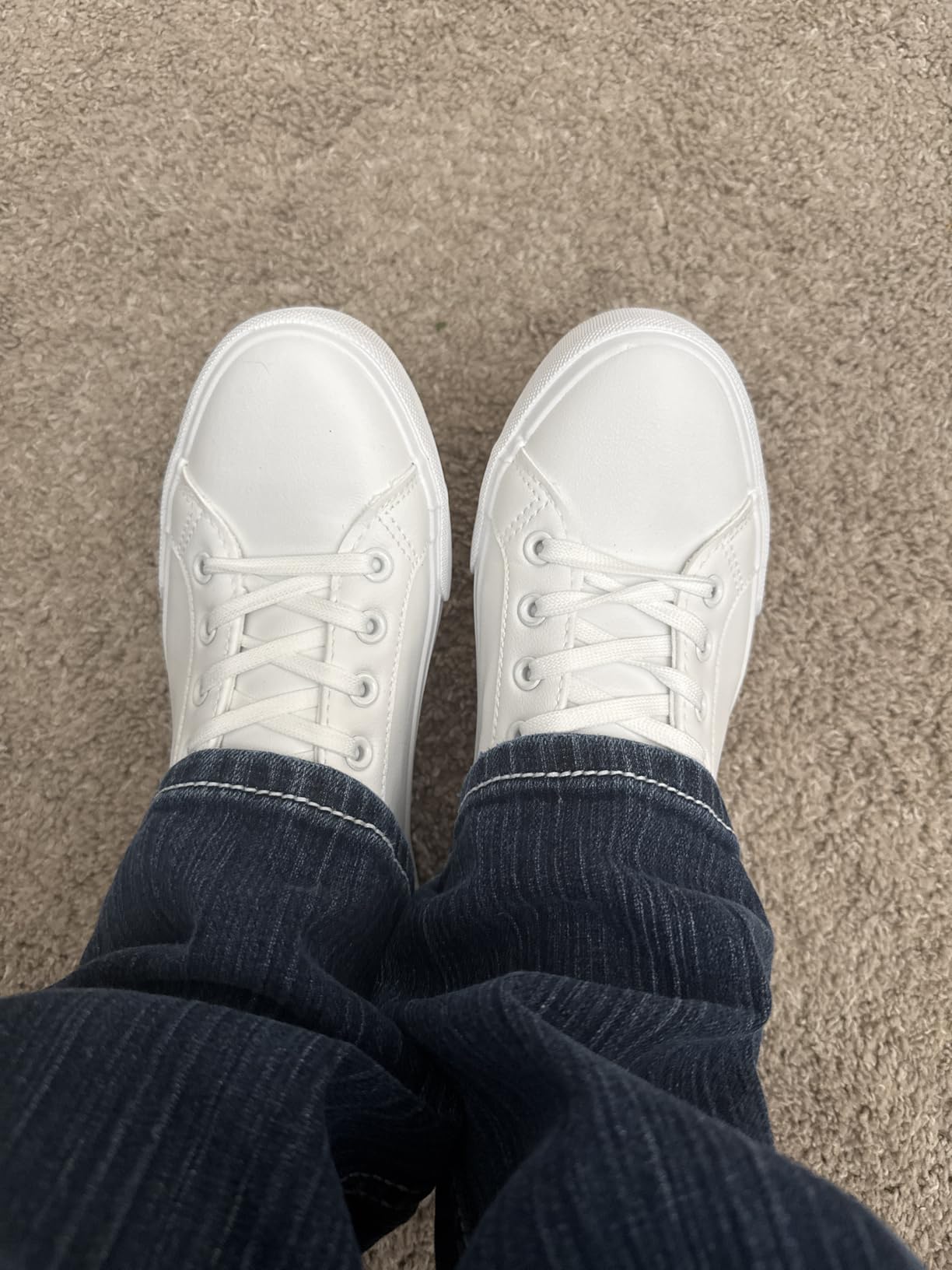 SERNIAL white tennis shoes styled with casual travel outfit showing versatility for everyday wear