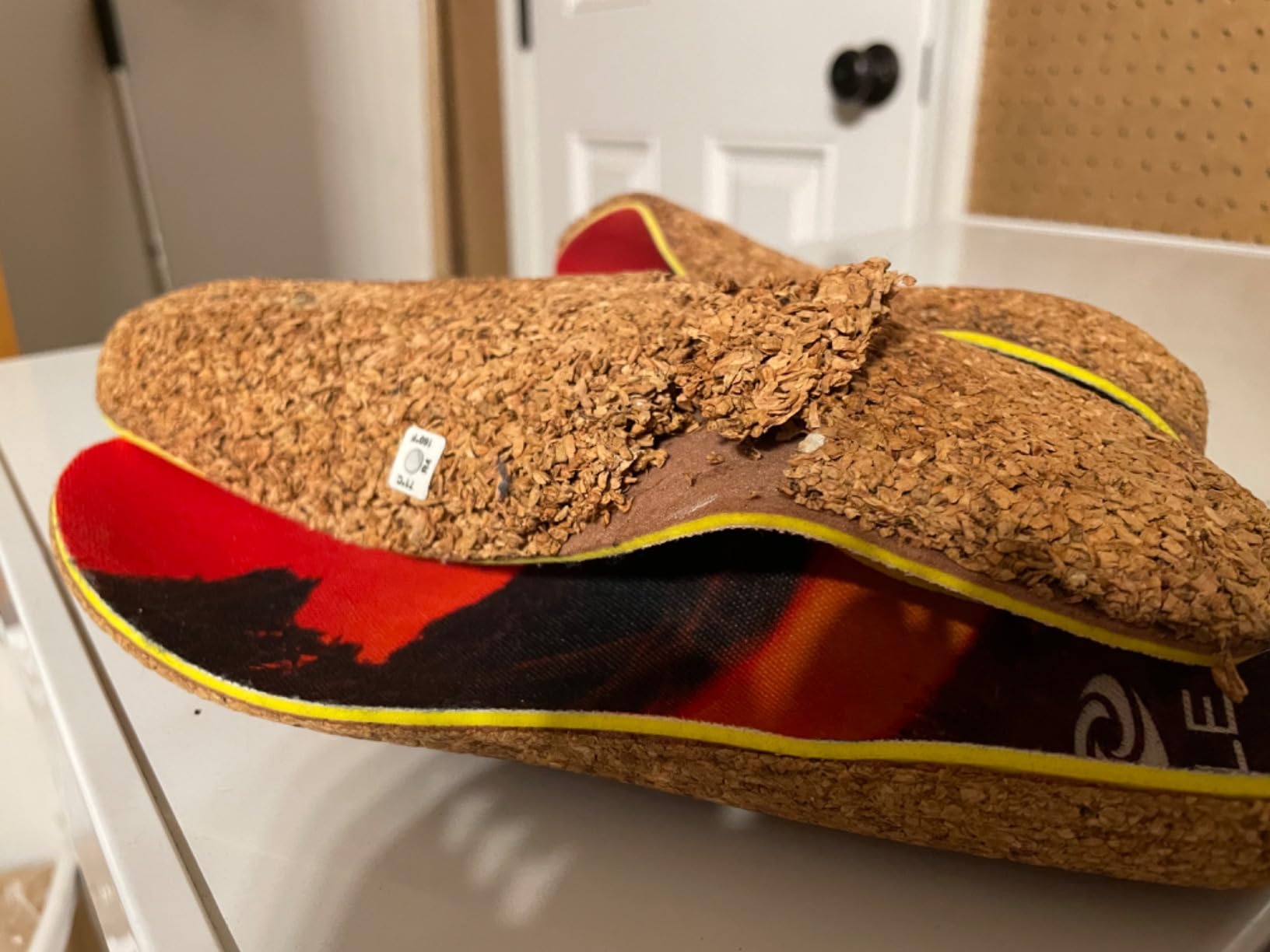 SOLE Performance Medium insoles showing cork base and metatarsal pad positioned for plantar fasciitis relief