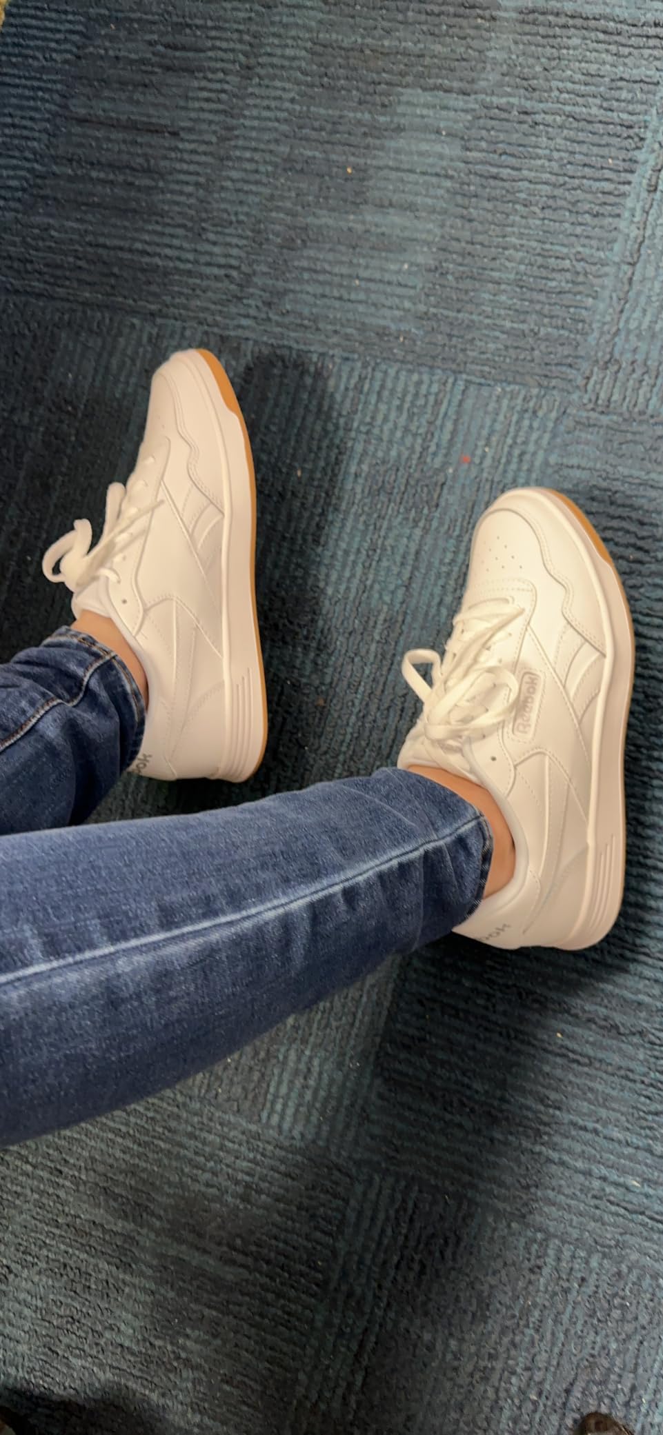Reebok Court Advance lifestyle shot demonstrating versatility paired with different casual outfit styles