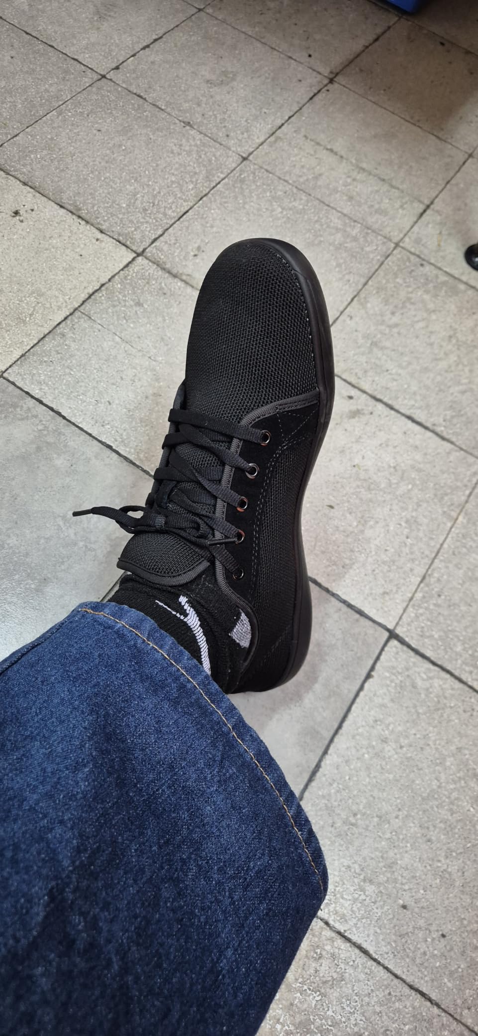 WHITIN barefoot sneakers being worn during gym workout showing the stable platform for weight training