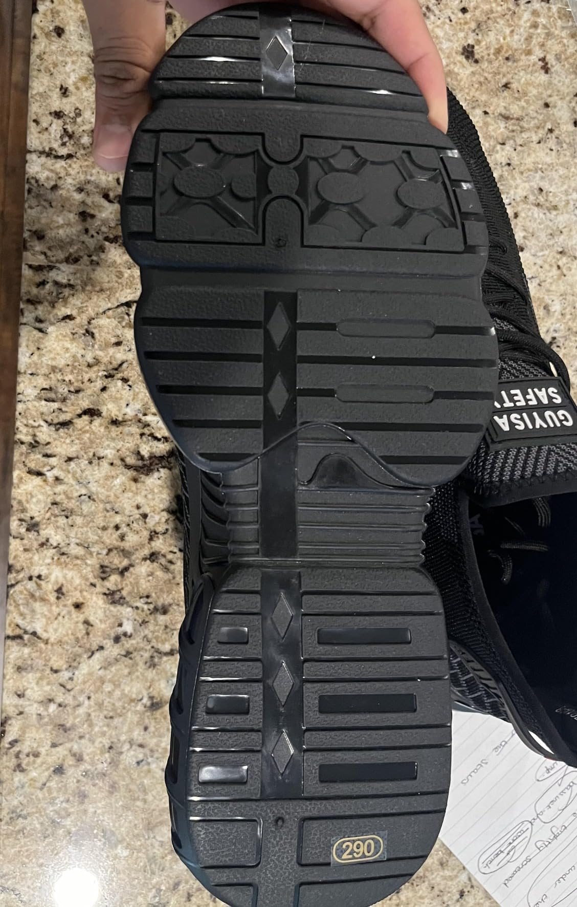 Steel toe work shoes worn during warehouse work showing versatility and all-day wearability