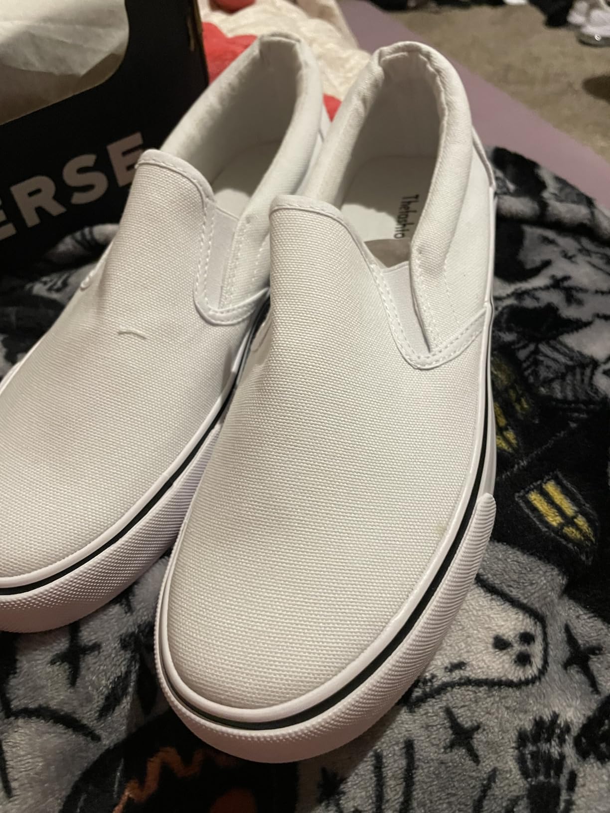 Emma slip-on sneakers tested on outdoor urban surfaces showing rubber outsole traction on pavement