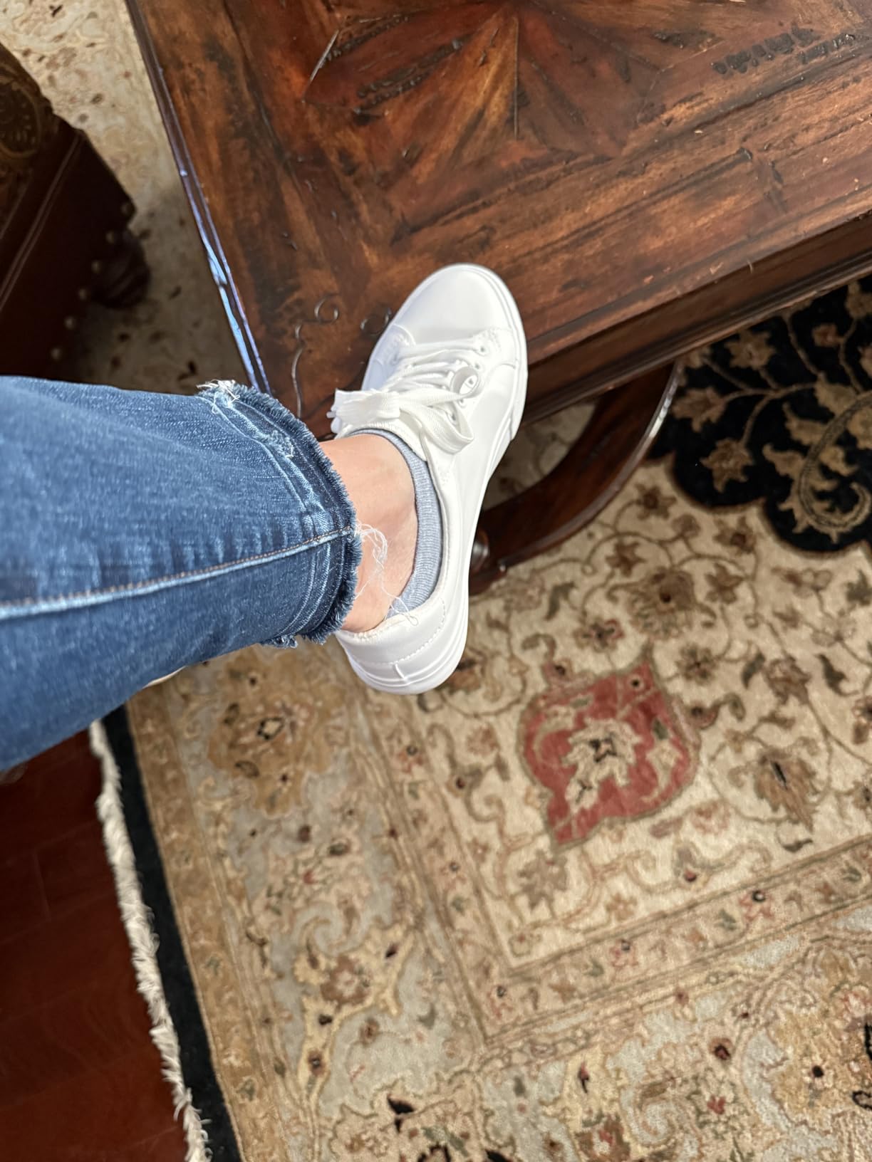 SERNIAL white tennis shoe PU leather upper showing clean stitching and construction quality