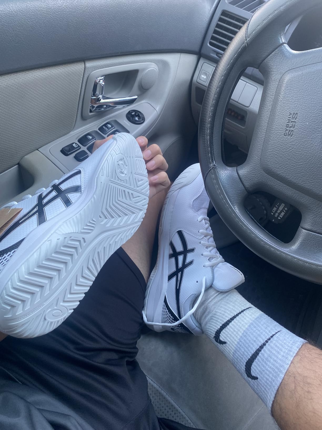 ASICS Gel-Dedicate 8 side view showing TRUSSTIC shank and synthetic leather toe overlays