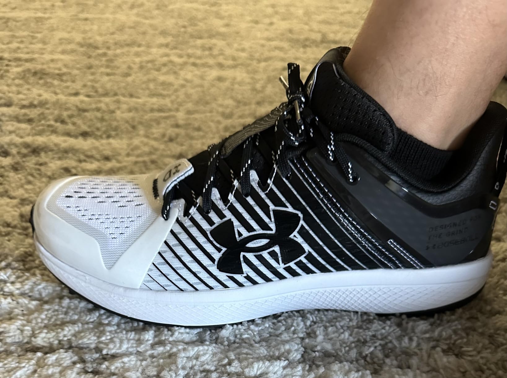 Under Armour Yard Low turf cleat TPU cage and toe drag protection reinforcement close-up
