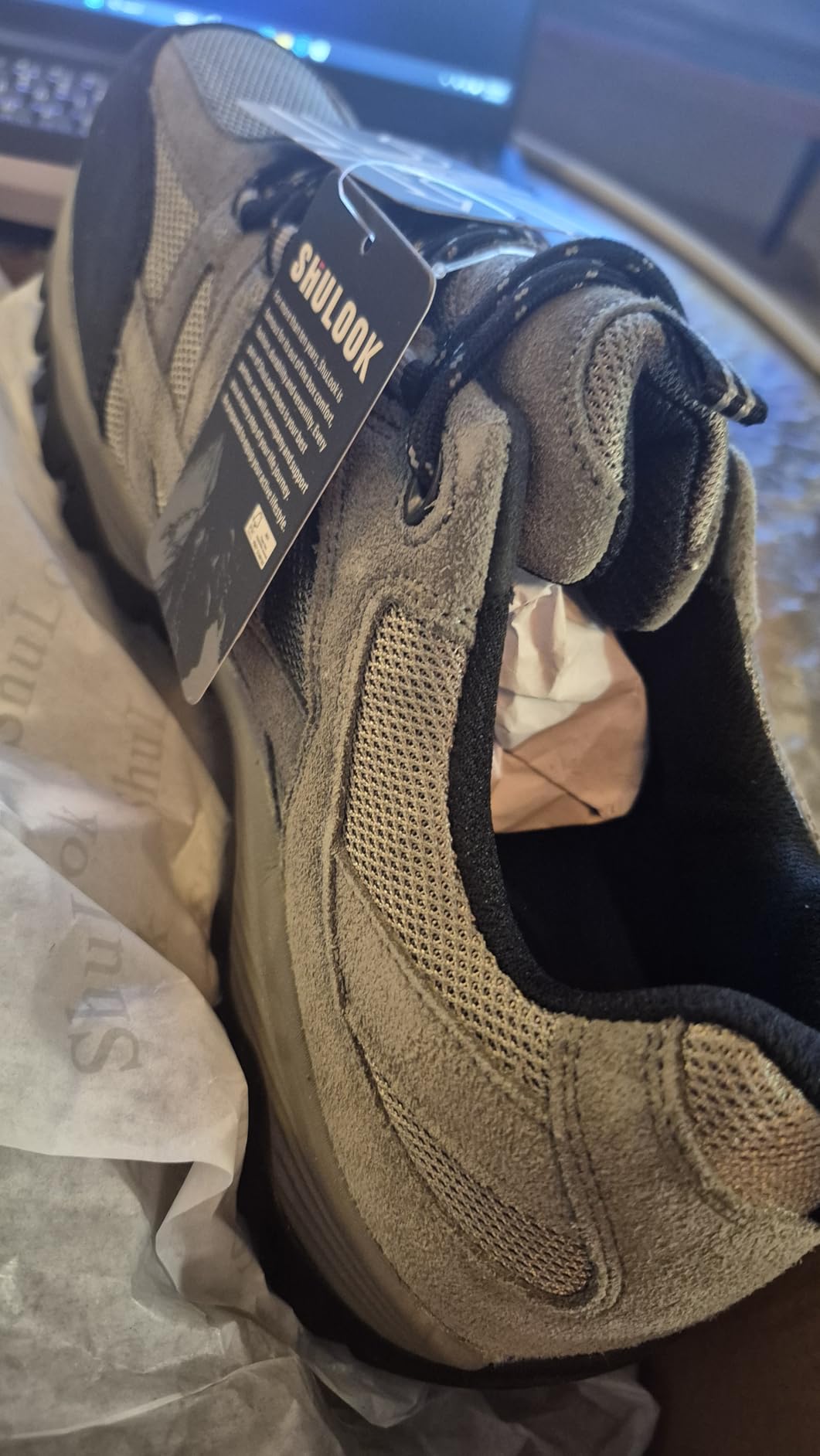 SHULOOK shoes in wet grass and muddy conditions during waterproof testing