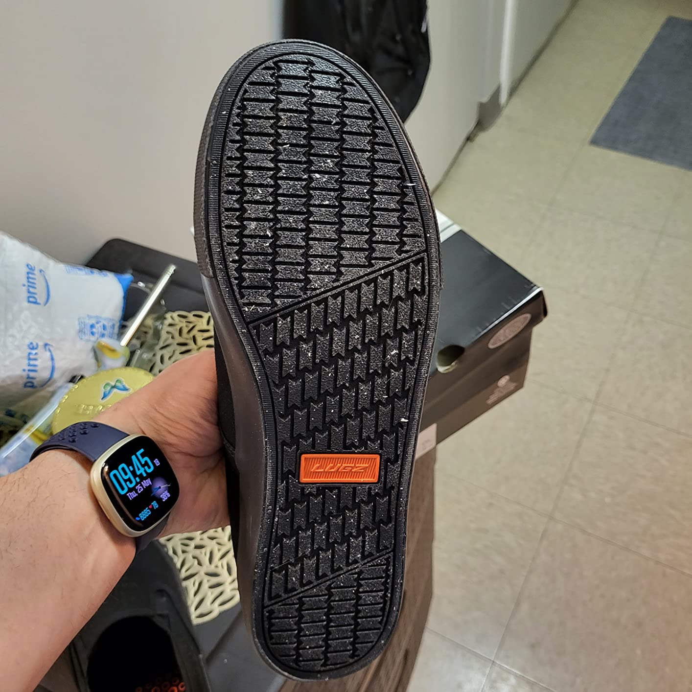 Lugz Clipper construction details showing canvas upper to rubber sole bonding at the toe cap flex area