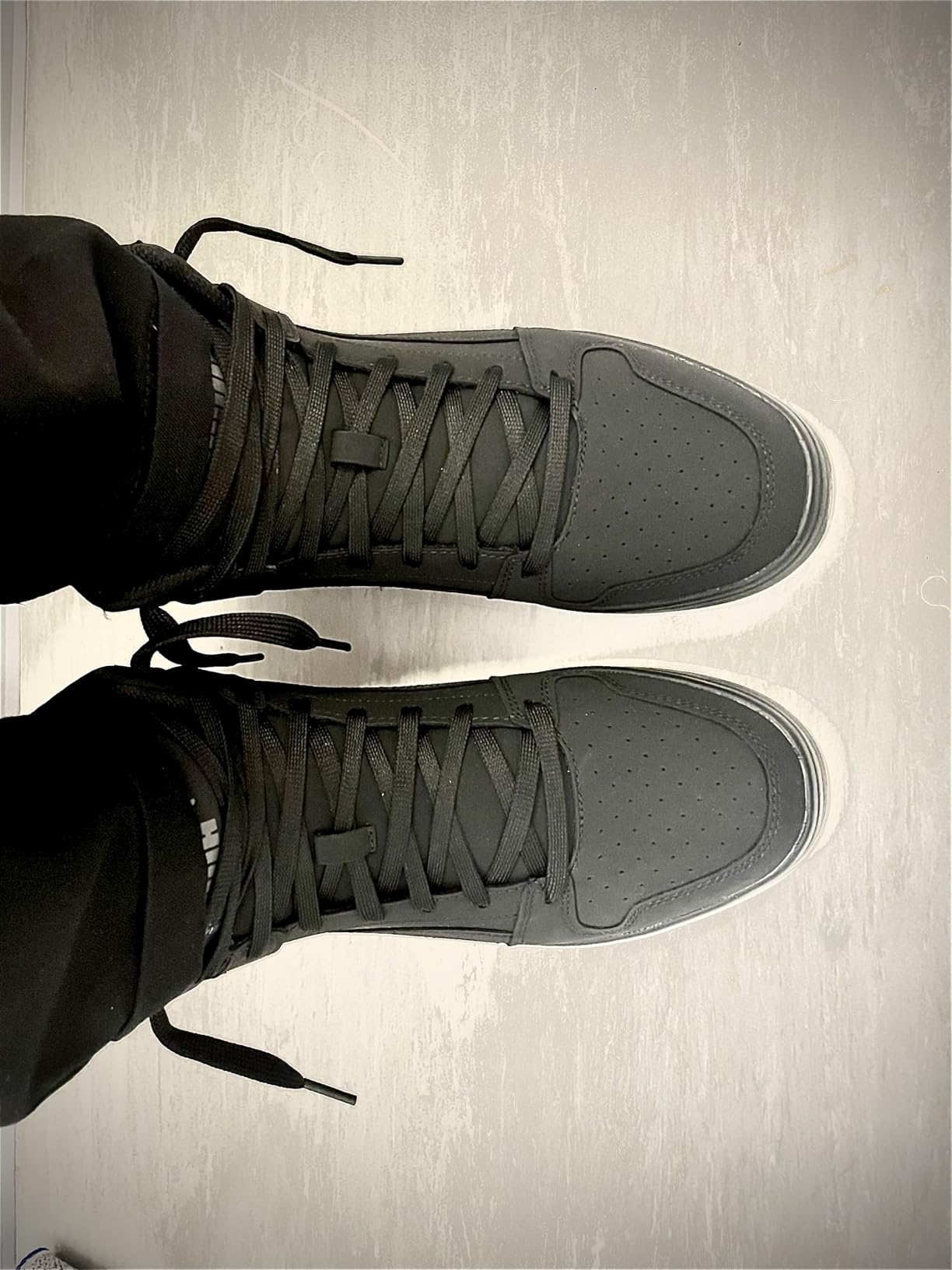 PUMA Rebound Layup worn during gym weightlifting session showing stable platform and mid-top ankle support for lifting
